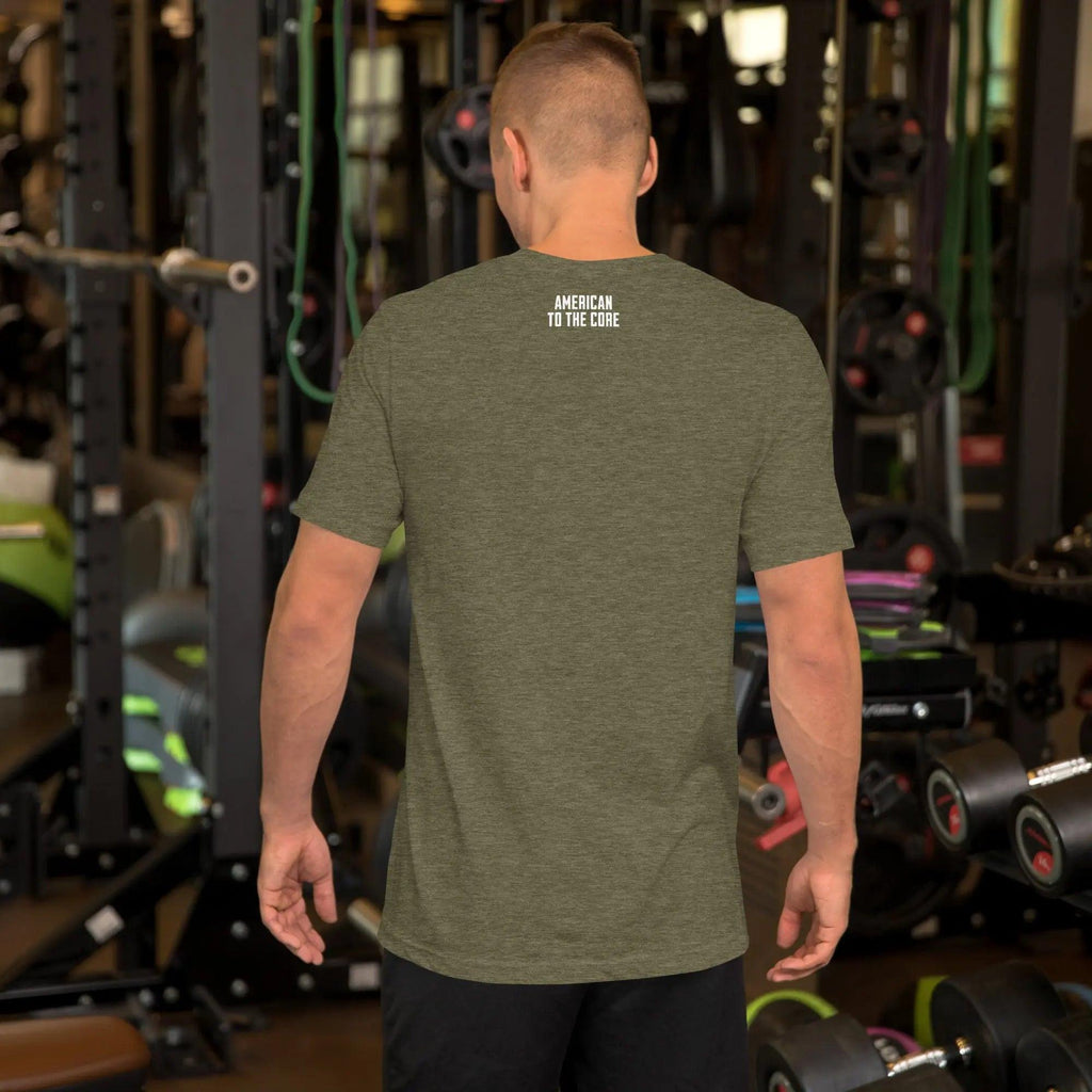 Back of a man wearing a heather olive patriotic t-shirt with the text "American To The Core."