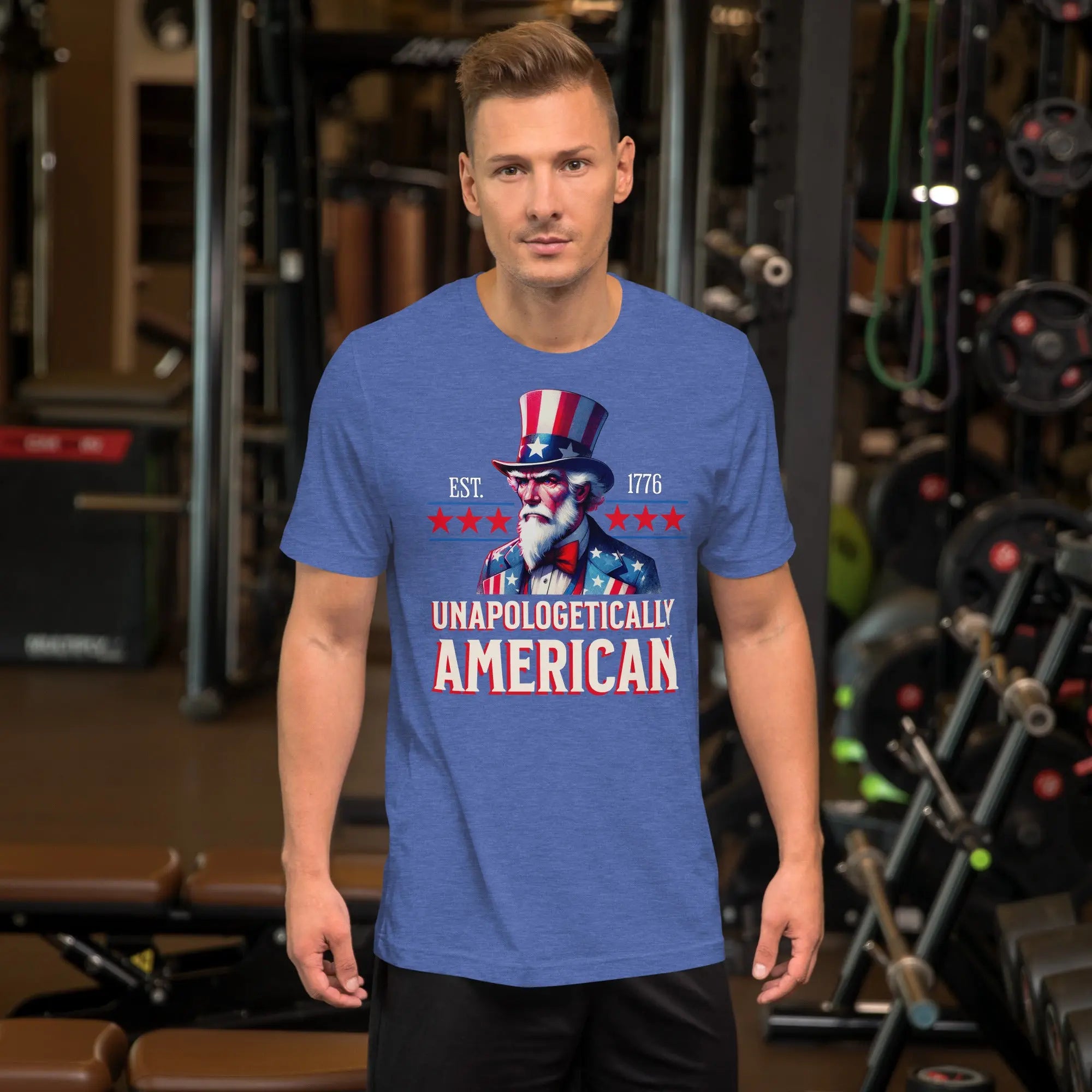 Man wearing a blue t-shirt with 'Unapologetically American' design in a gym setting