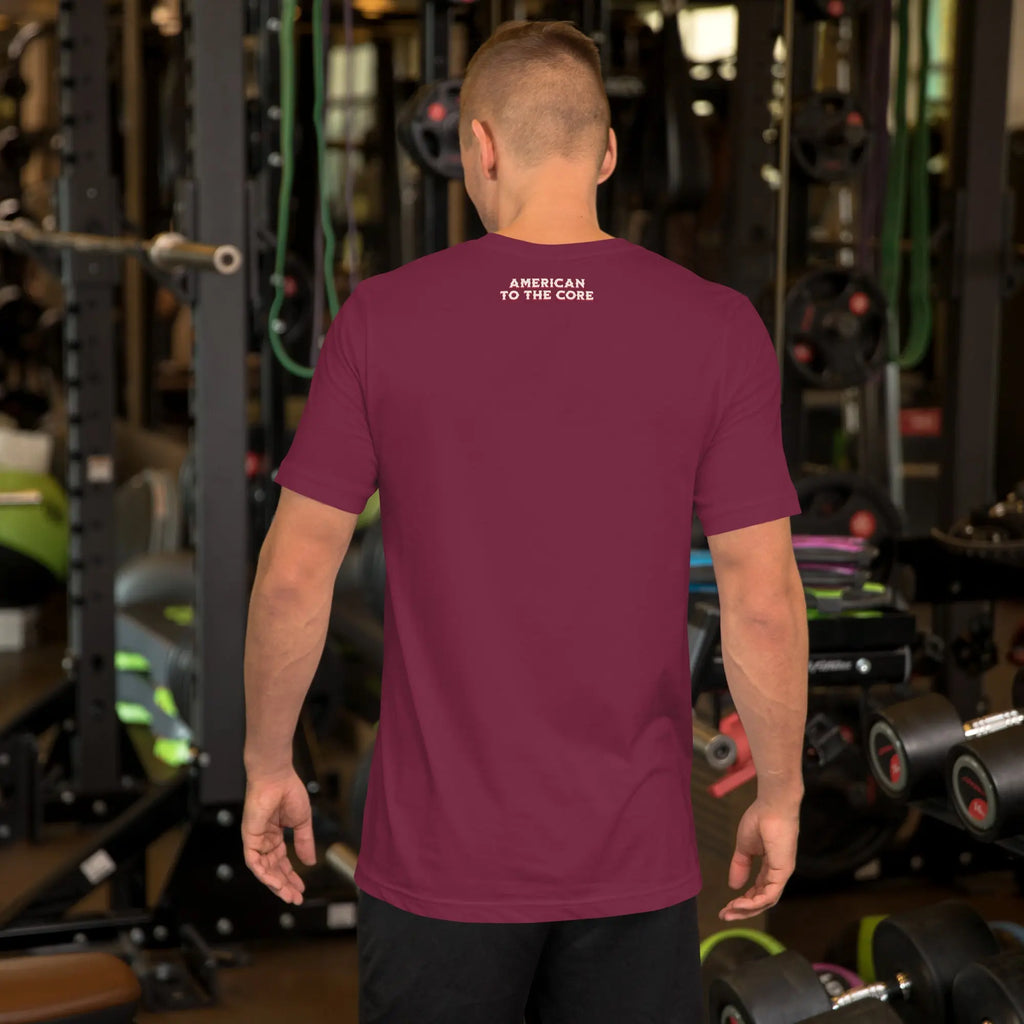 Back of a man wearing a maroon patriotic t-shirt with the text "American to the core."