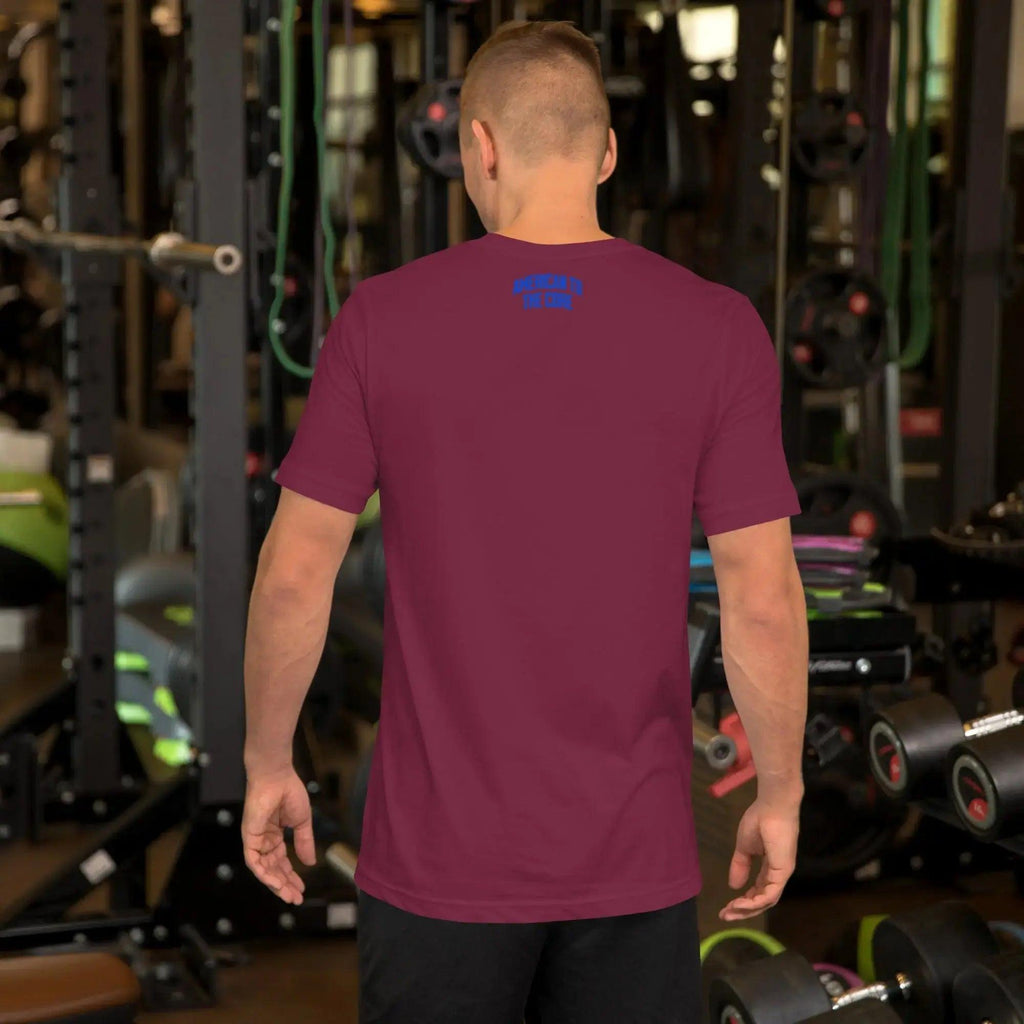 Back of a man wearing a maroon patriotic t-shirt with the text "American To The Core."