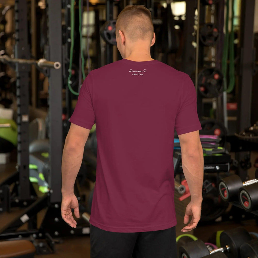 Back of a man wearing a maroon patriotic t-shirt with the text "American To The Core."