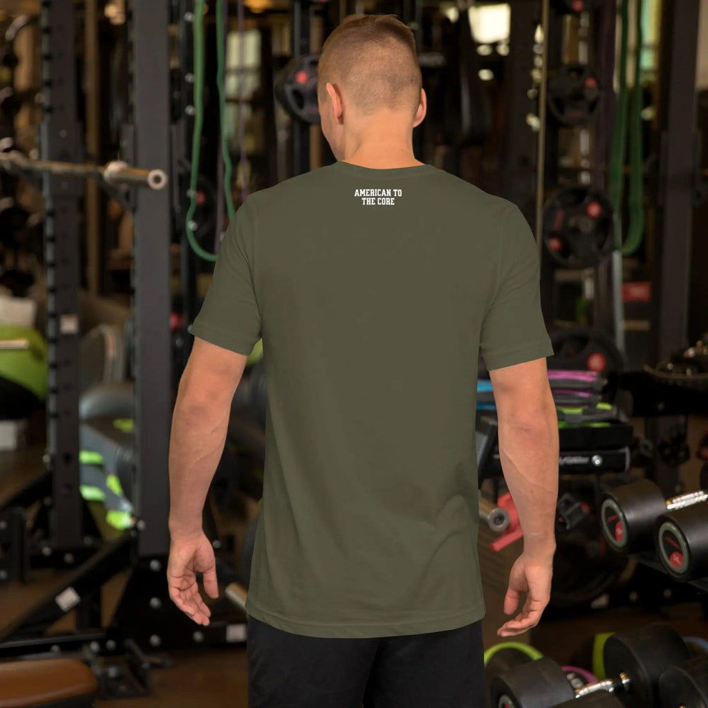 Back of a man wearing a military green patriotic t-shirt with the text "American To The Core."