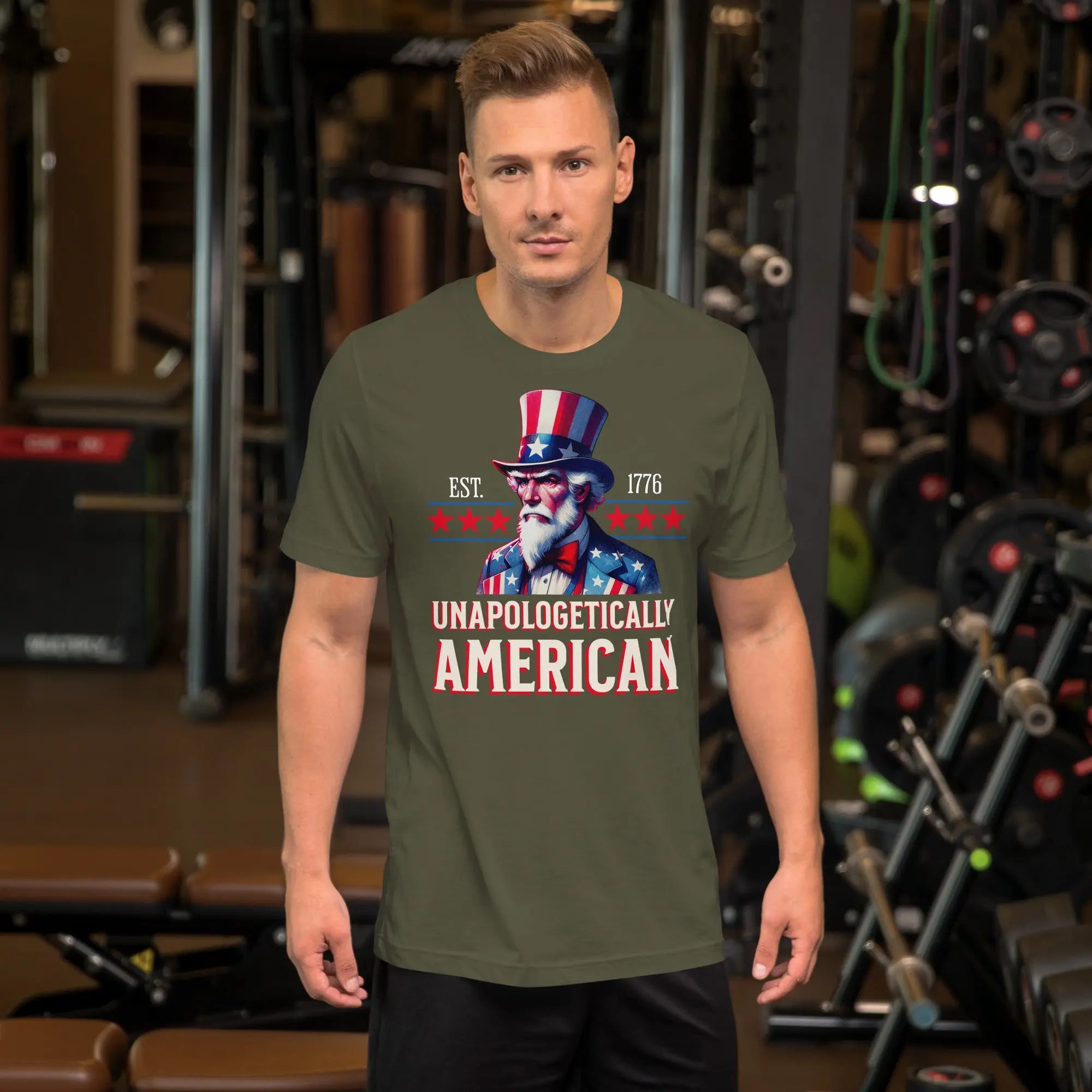 Man wearing a green t-shirt with a patriotic design in a gym setting