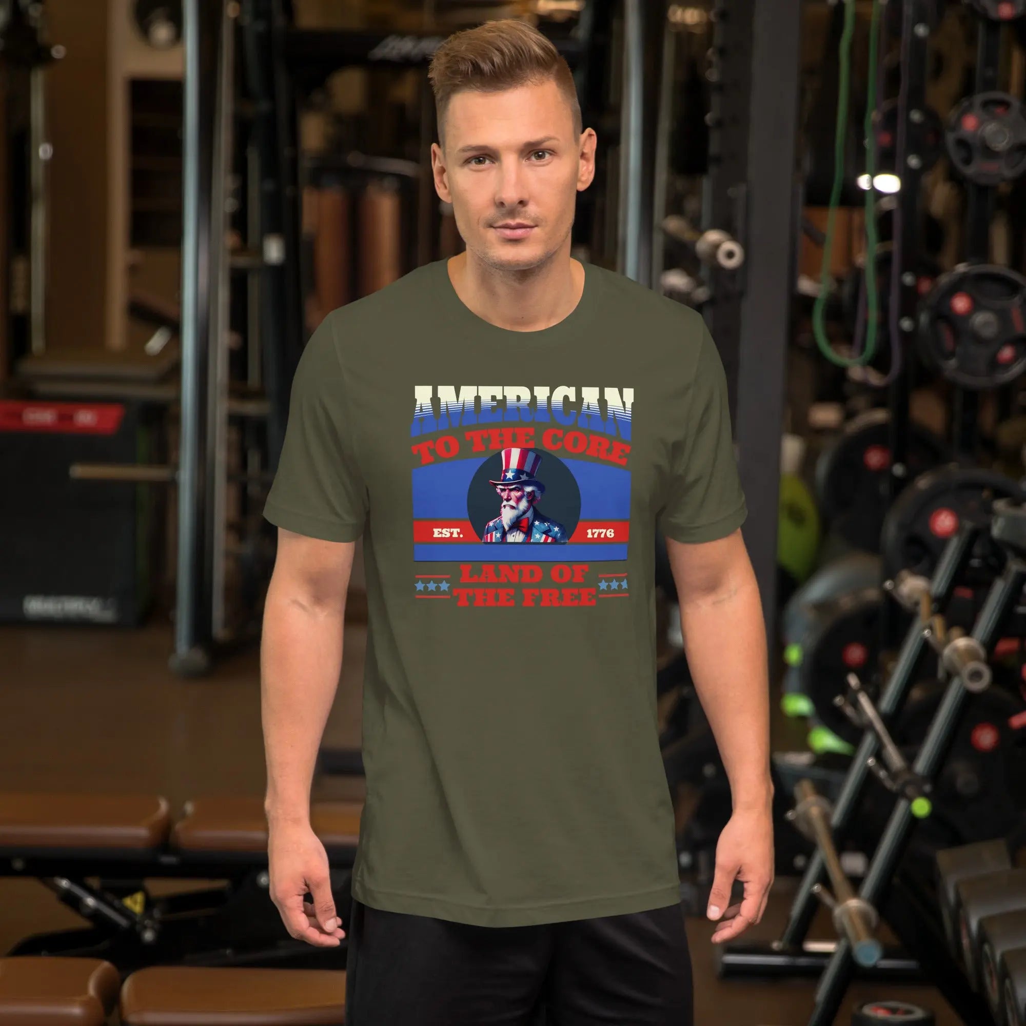 A man wearing a military green patriotic t-shirt with an image of Uncle Sam and "Land of the Free" text.