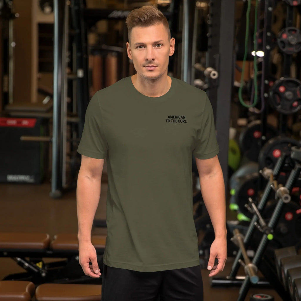 Front of man wearing a military green patriotic t-shirt with "American To The Core" text.