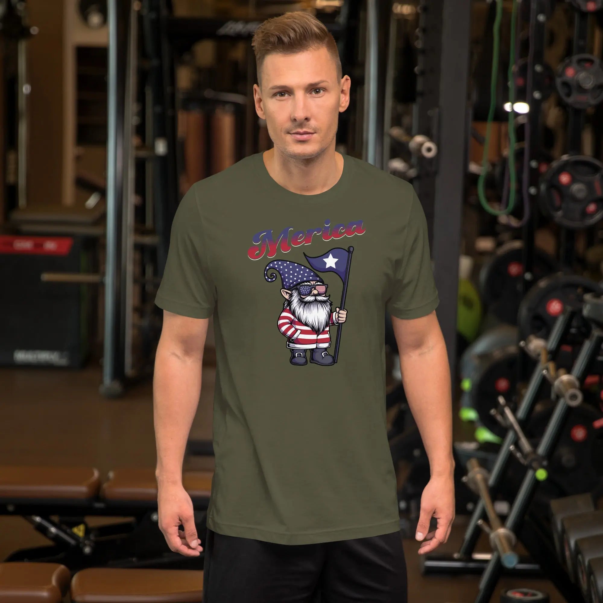 A man wearing a military green patriotic t-shirt with a gnome on it with "Merica" text.