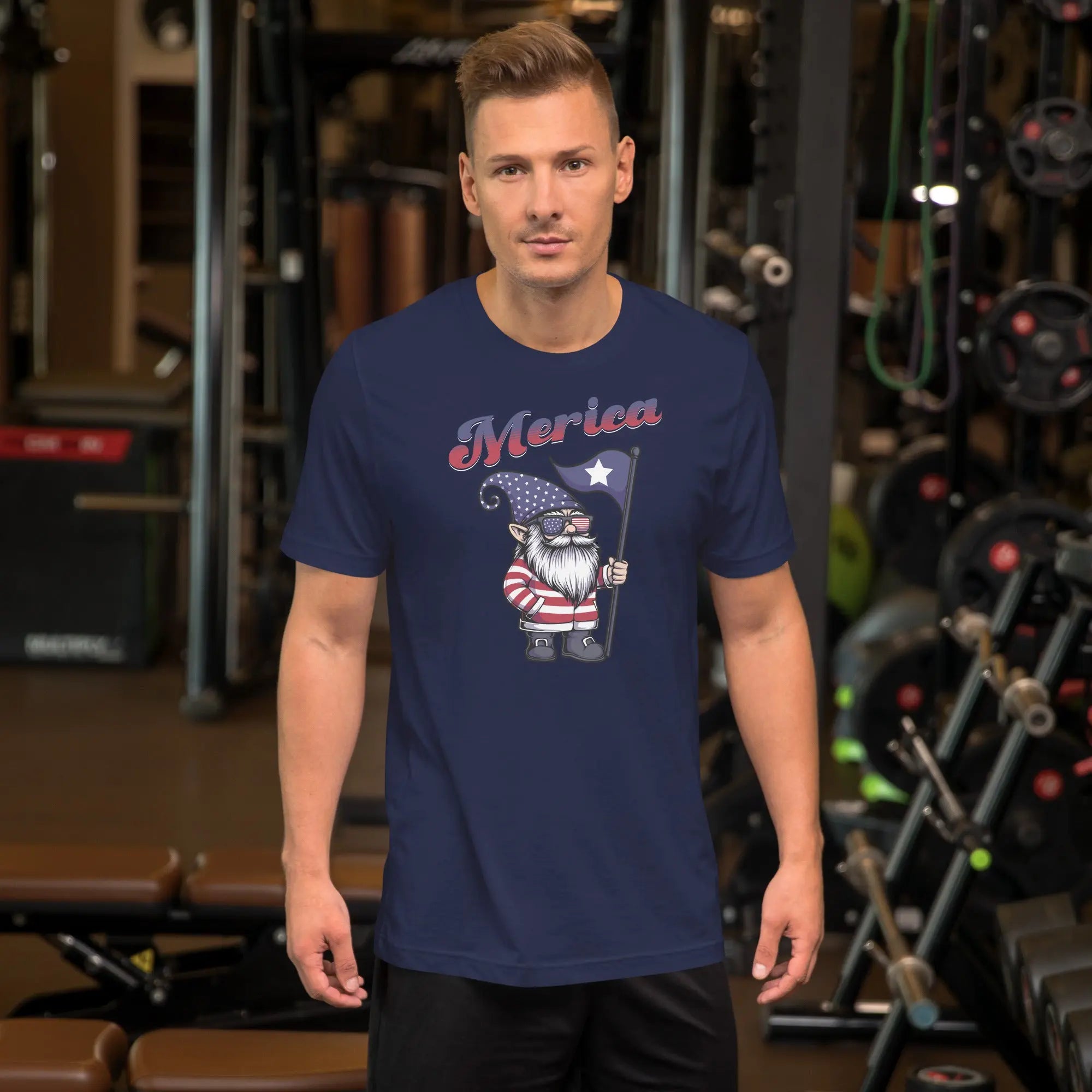 A man wearing a navy patriotic t-shirt with a gnome on it with "Merica" text.