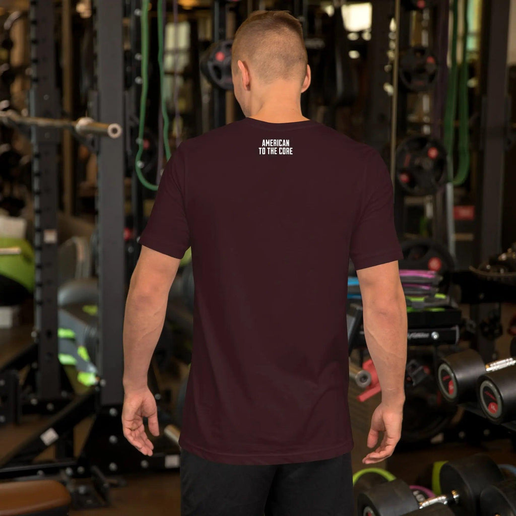Back of a man wearing an oxblood black patriotic t-shirt with the text "American To The Core."