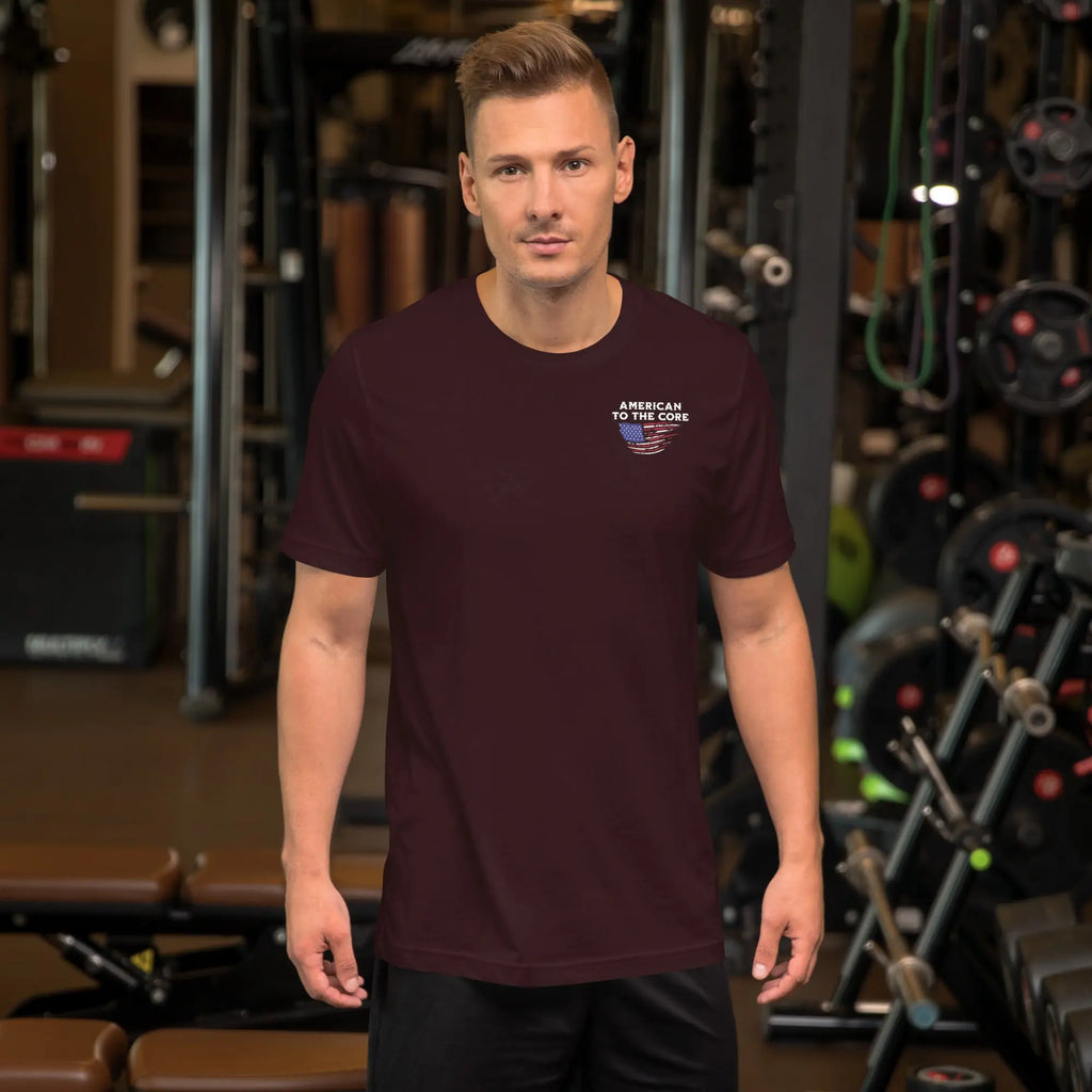 A man wearing an oxblood black patriotic t-shirt with "American To The Core" text.