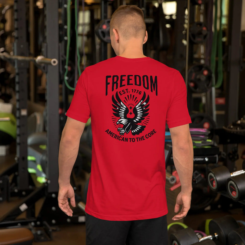 Back of man wearing a red patriotic t-shirt with an eagle and "freedom est. 1776" text