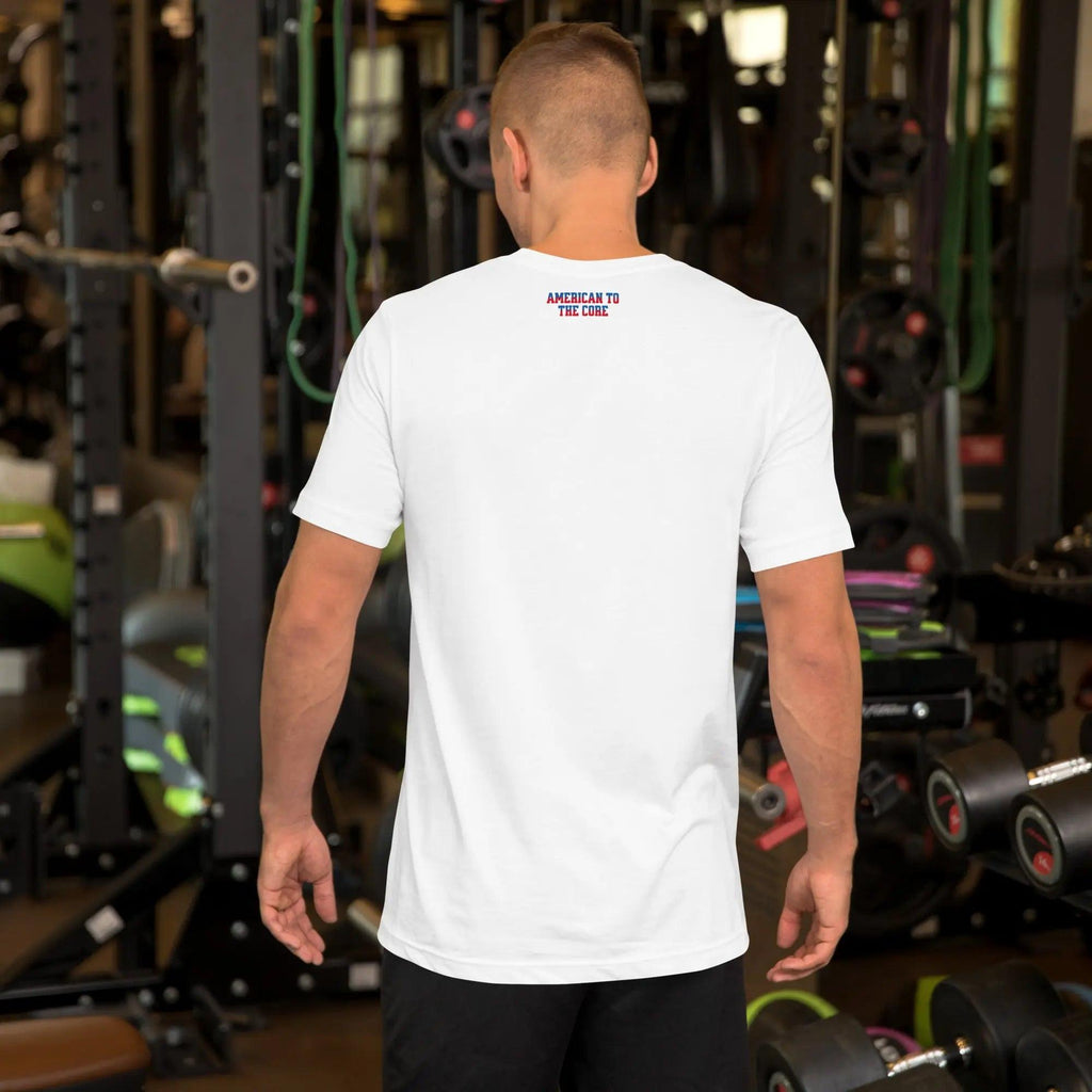 Back of a man wearing a white patriotic men's T-shirt with the text "American To The Core" in red and blue.