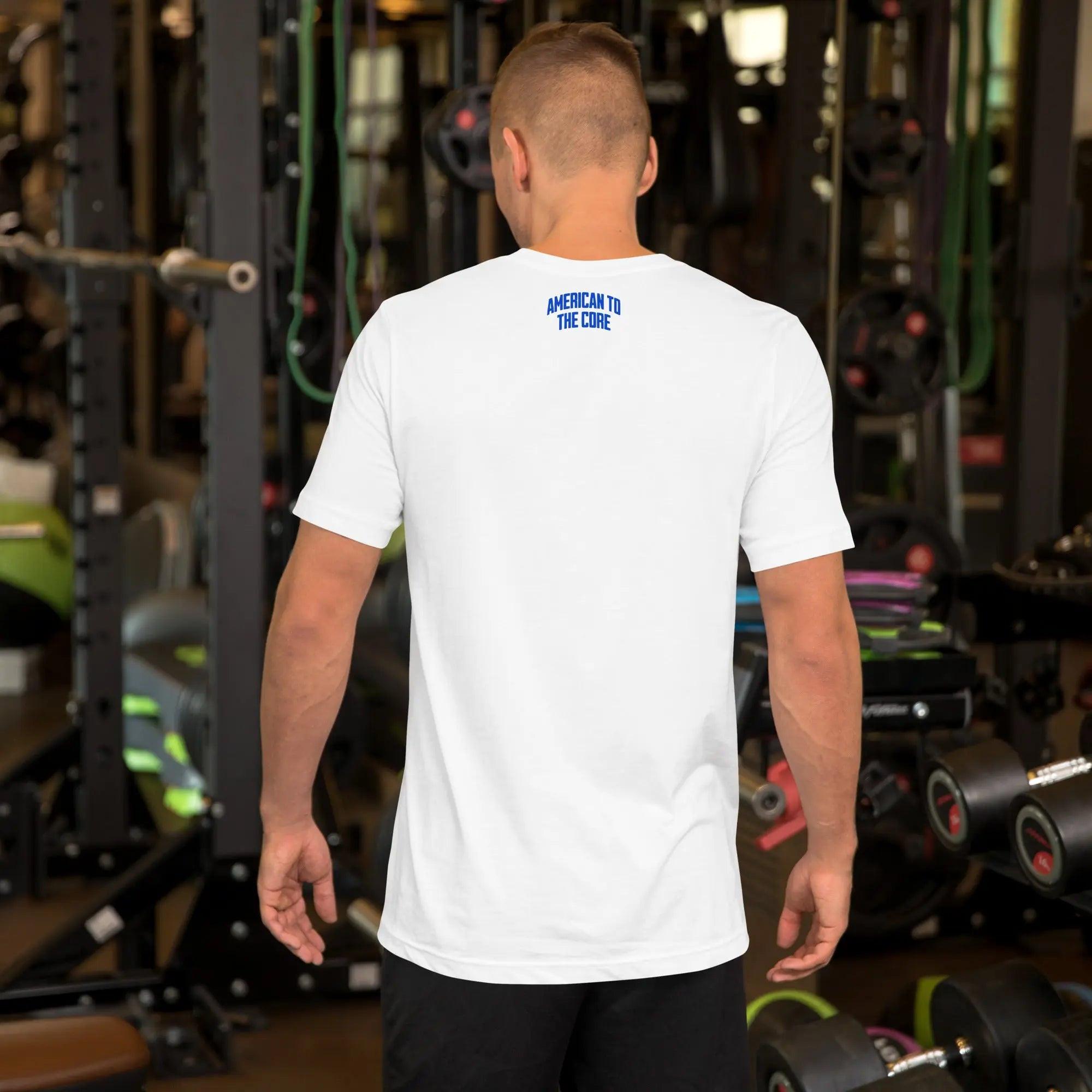 Back of a man wearing a white patriotic t-shirt with the text "American To The Core."