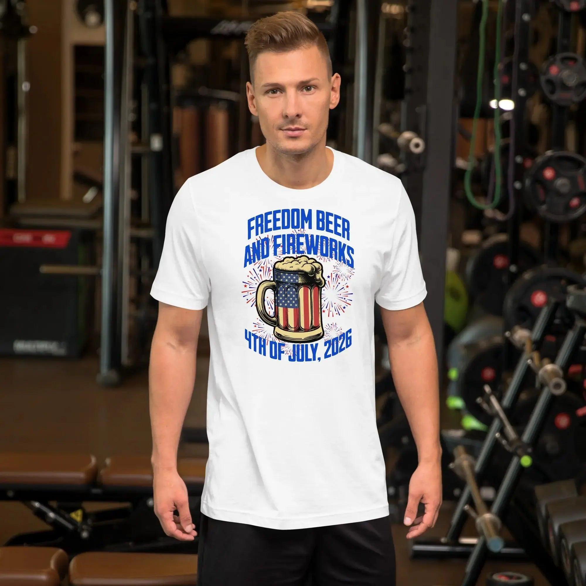 A man wearing a white patriotic t-shirt with a beer mug and fireworks with the text "Freedom, Beer, and Fireworks" and "4th of July, 2026."