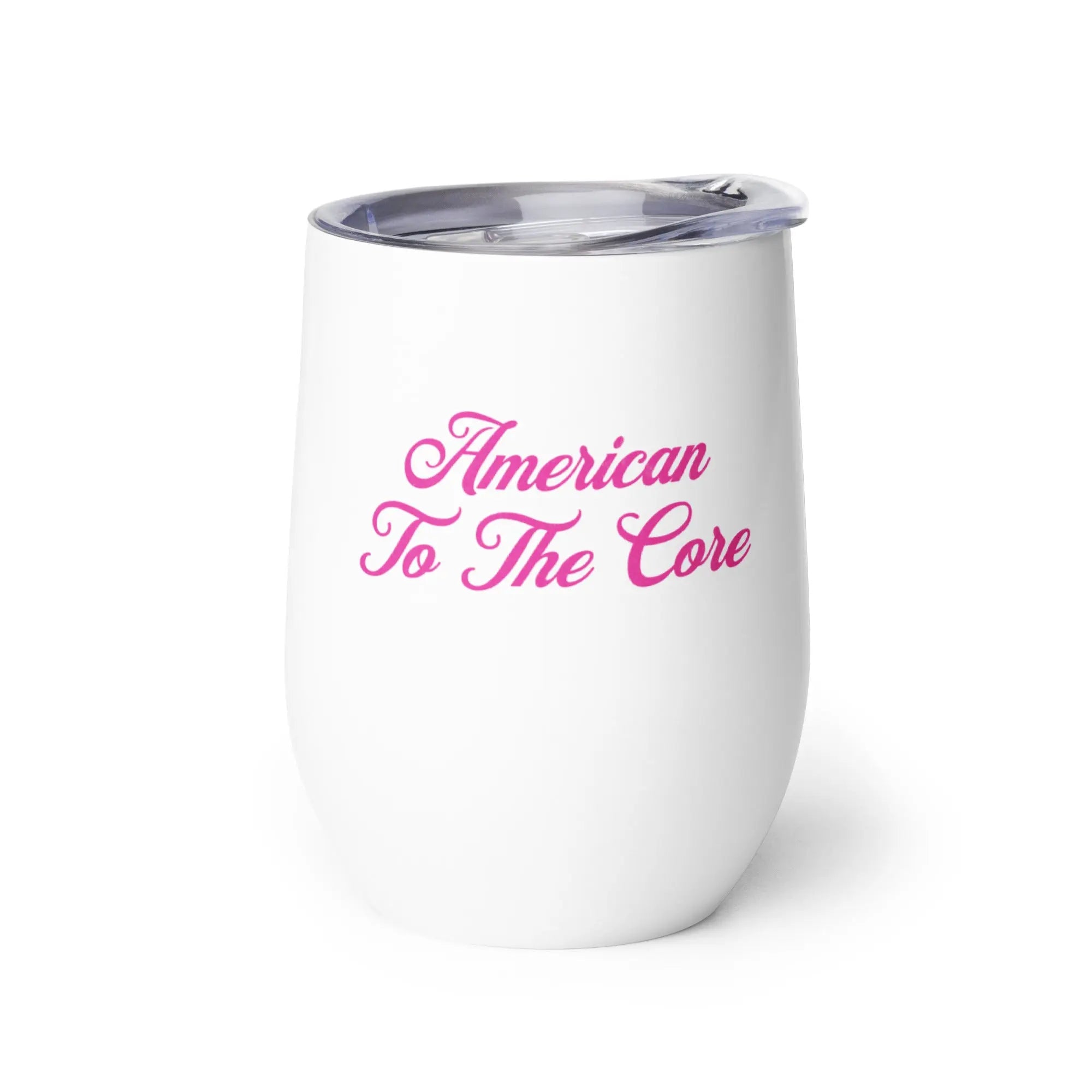 White tumbler with pink text 'American To The Core' on a white background
