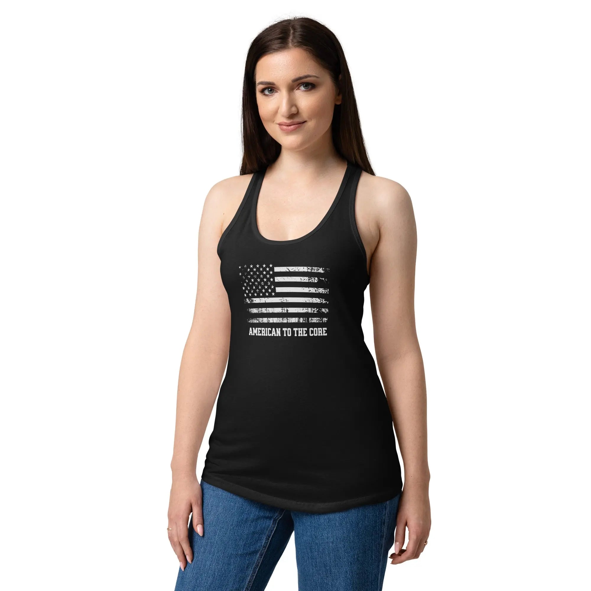 A woman wearing a black patriotic tank top with the American flag and the text "American to the core."