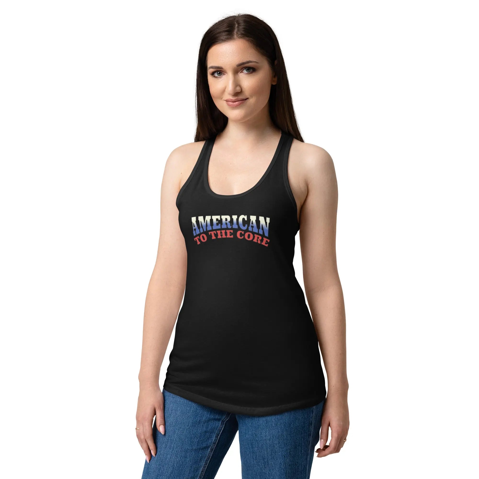 A woman wearing a black patriotic tank top with the text "American To The Core" in red, white, and blue. 