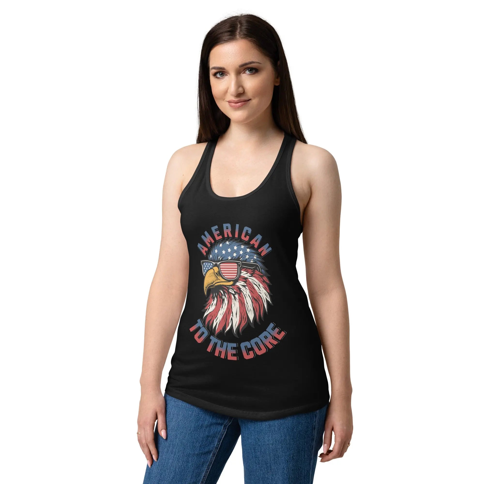 A woman wearing a black patriotic tank top with a eagle head and the text "American to the core" 