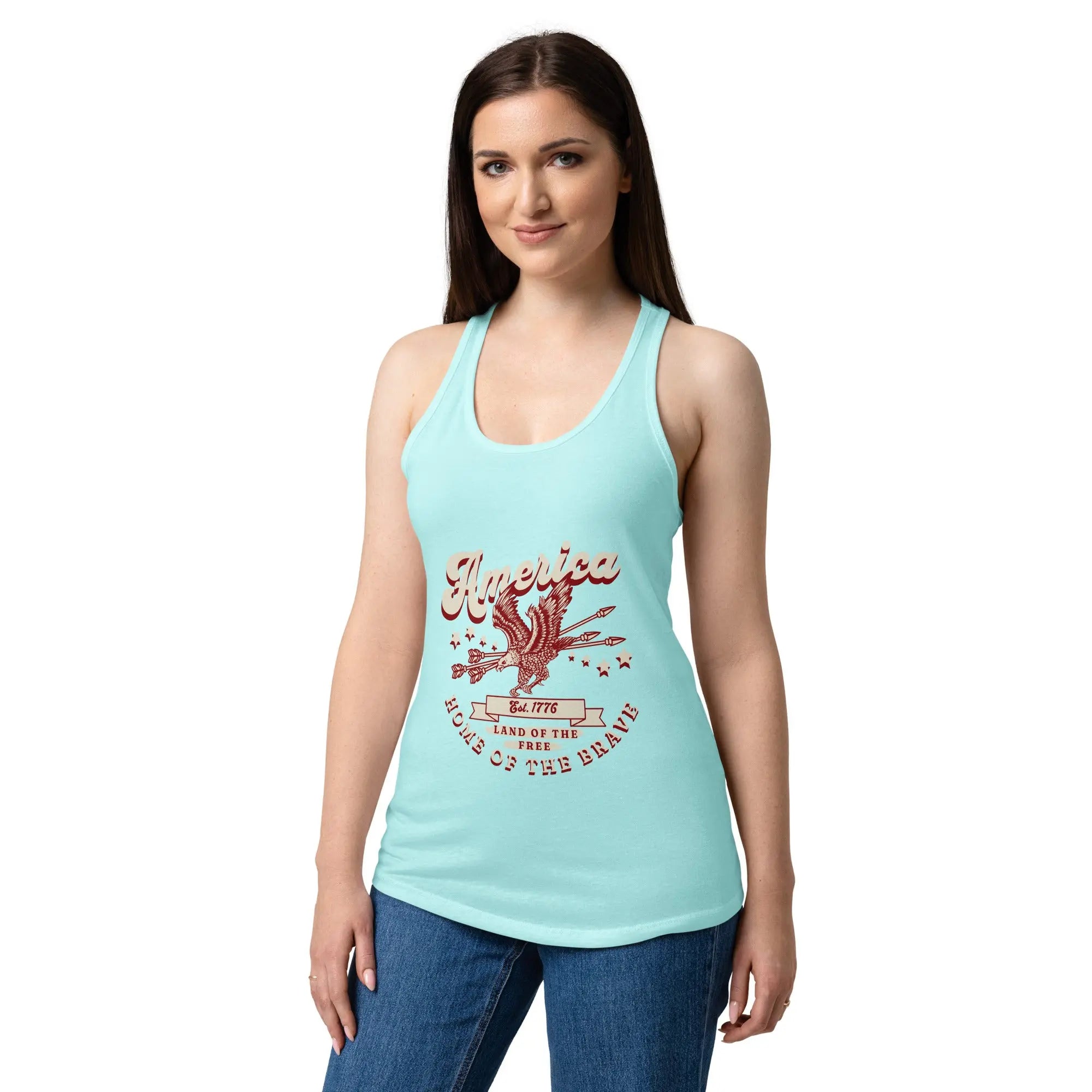 A woman wearing a cancun blue patriotic tank top with a flying eagle and the text "America Home of the brave." 