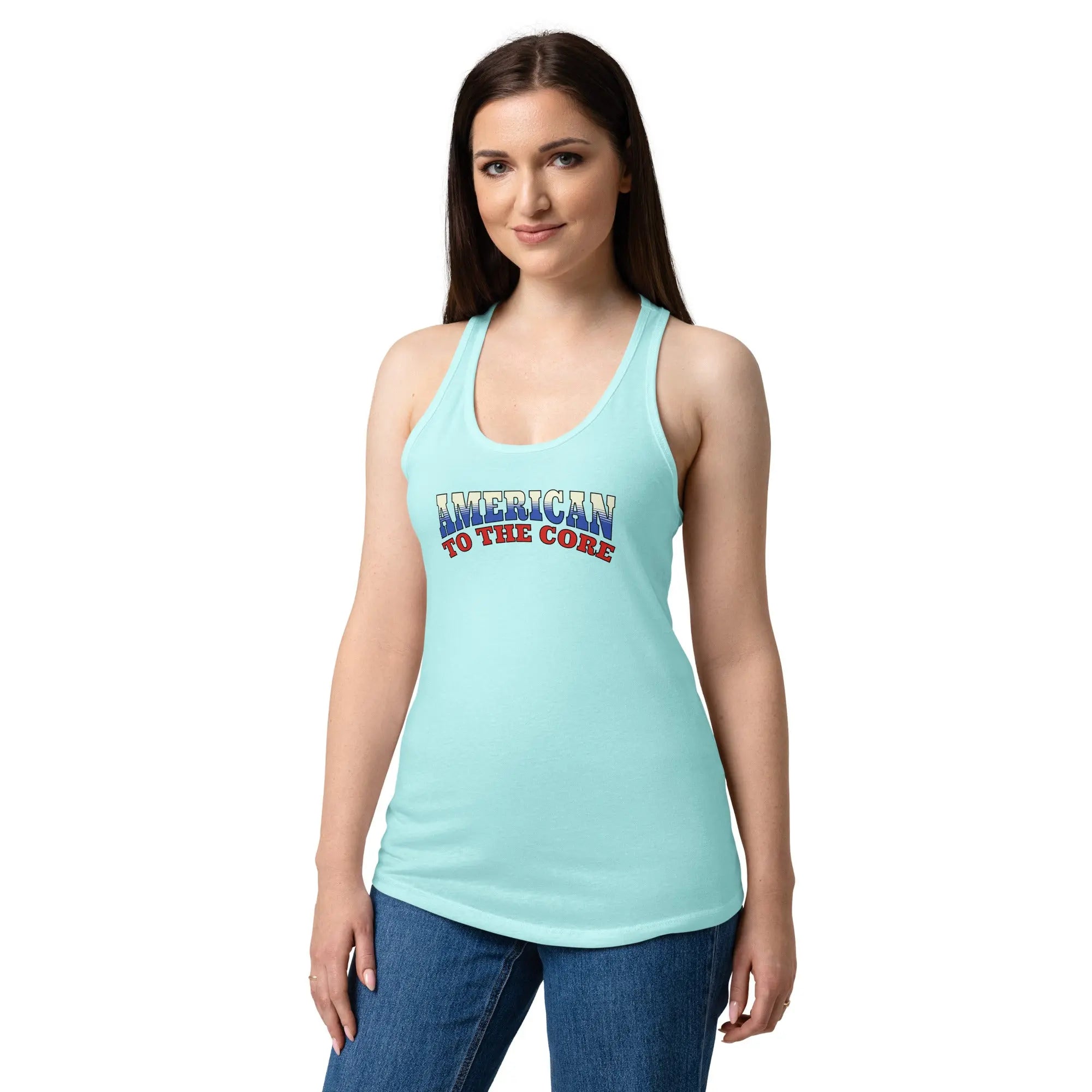 A woman wearing a cancun blue patriotic tank top with the text "American To The Core" in red, white, and blue. 