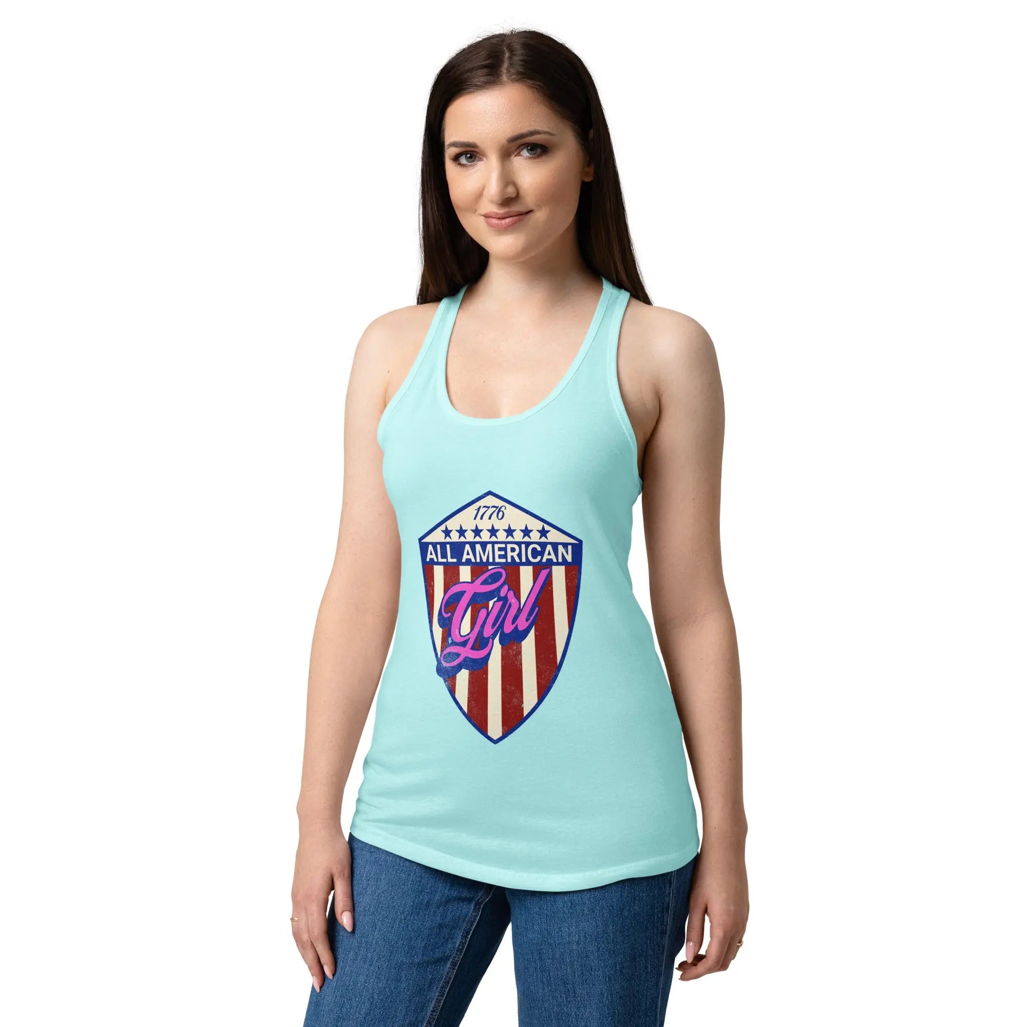 A woman wearing a cancun blue patriotic tank top with an eagle head and the text "Freedom isn't free" 