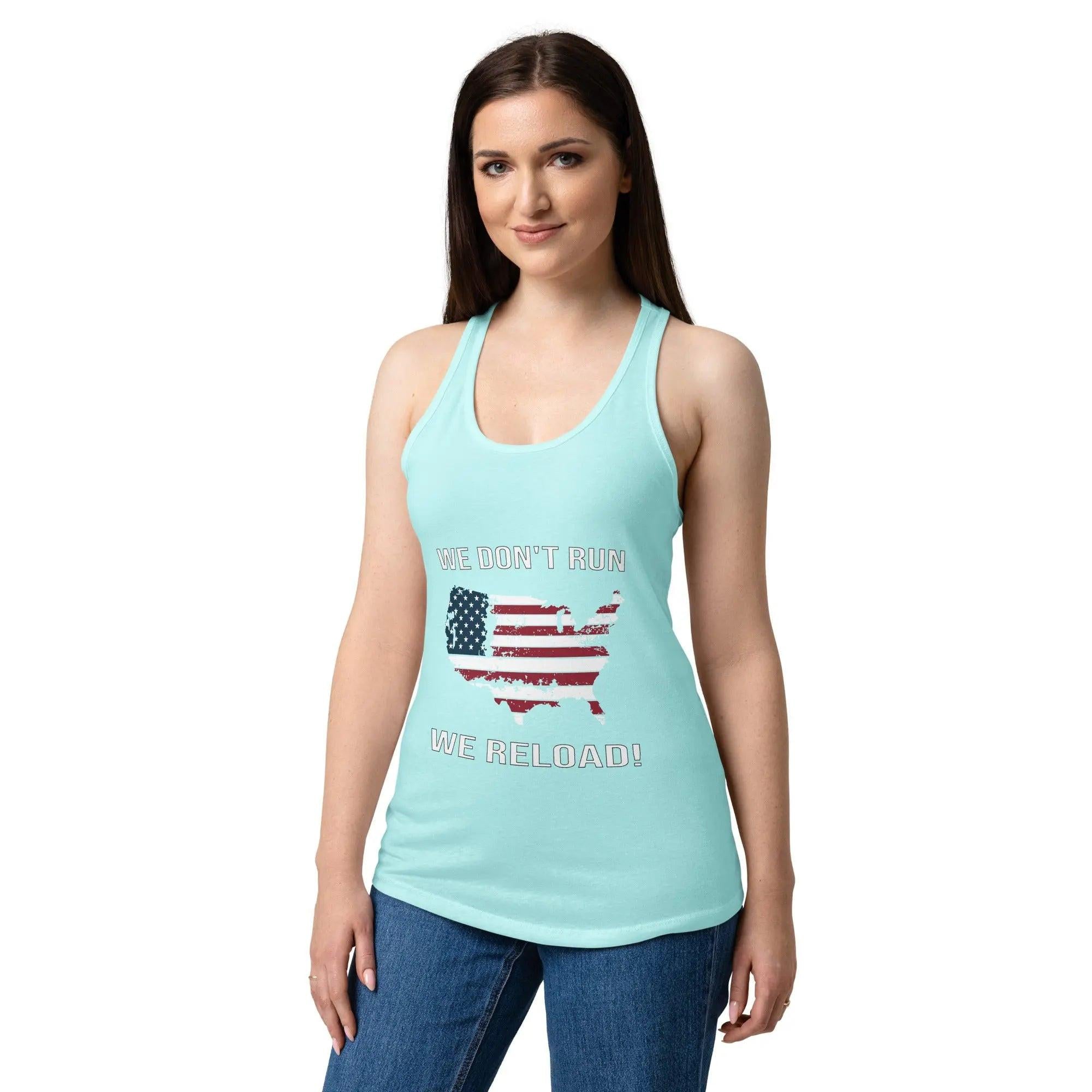 A woman wearing a cancun blue patriotic tank top with the American flag in the shape of America and the text "We Don't Run, We Reload!"