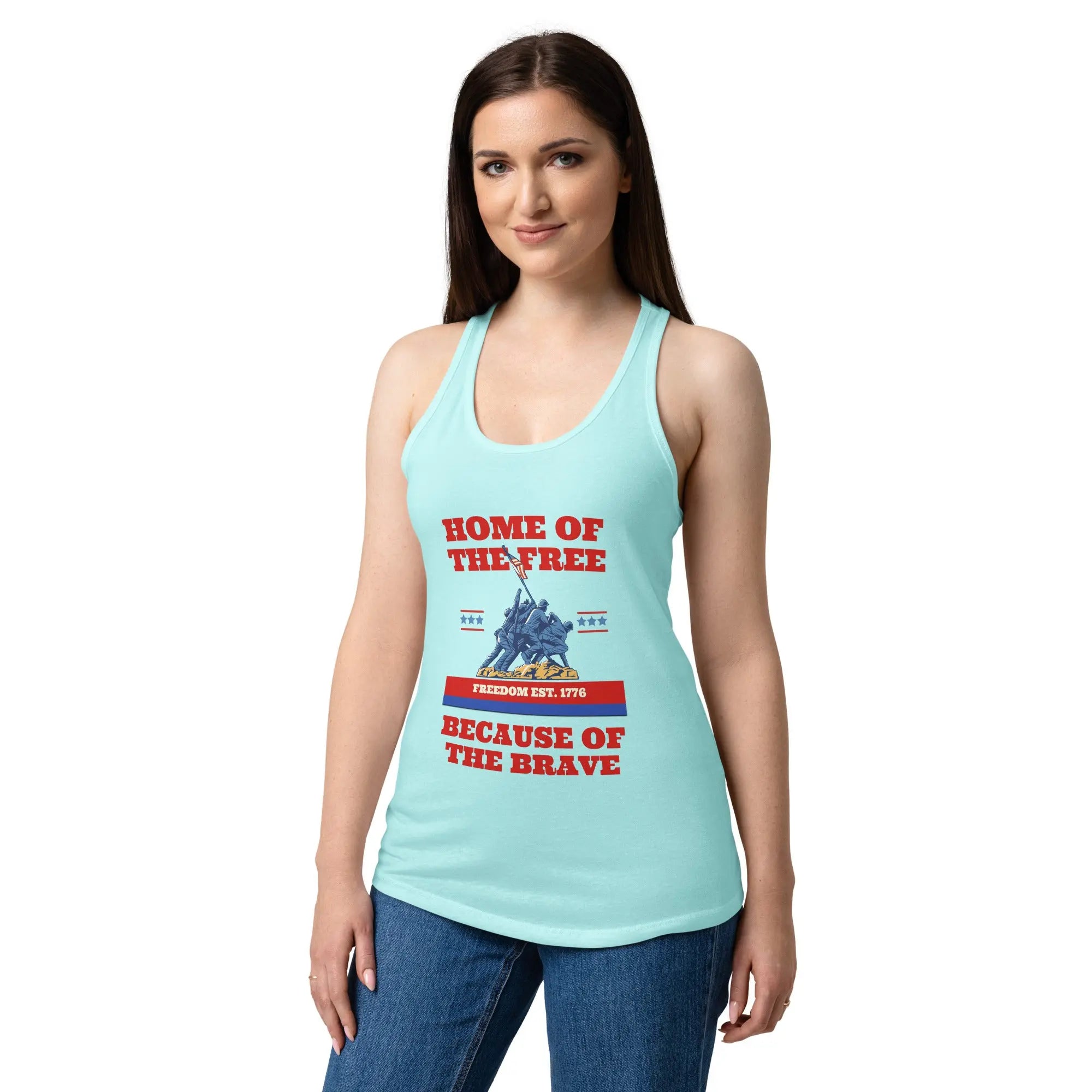 A woman wearing a cancunblue patriotic tank top with soldiers raising the flag and the text "Home of the free because of the brave."