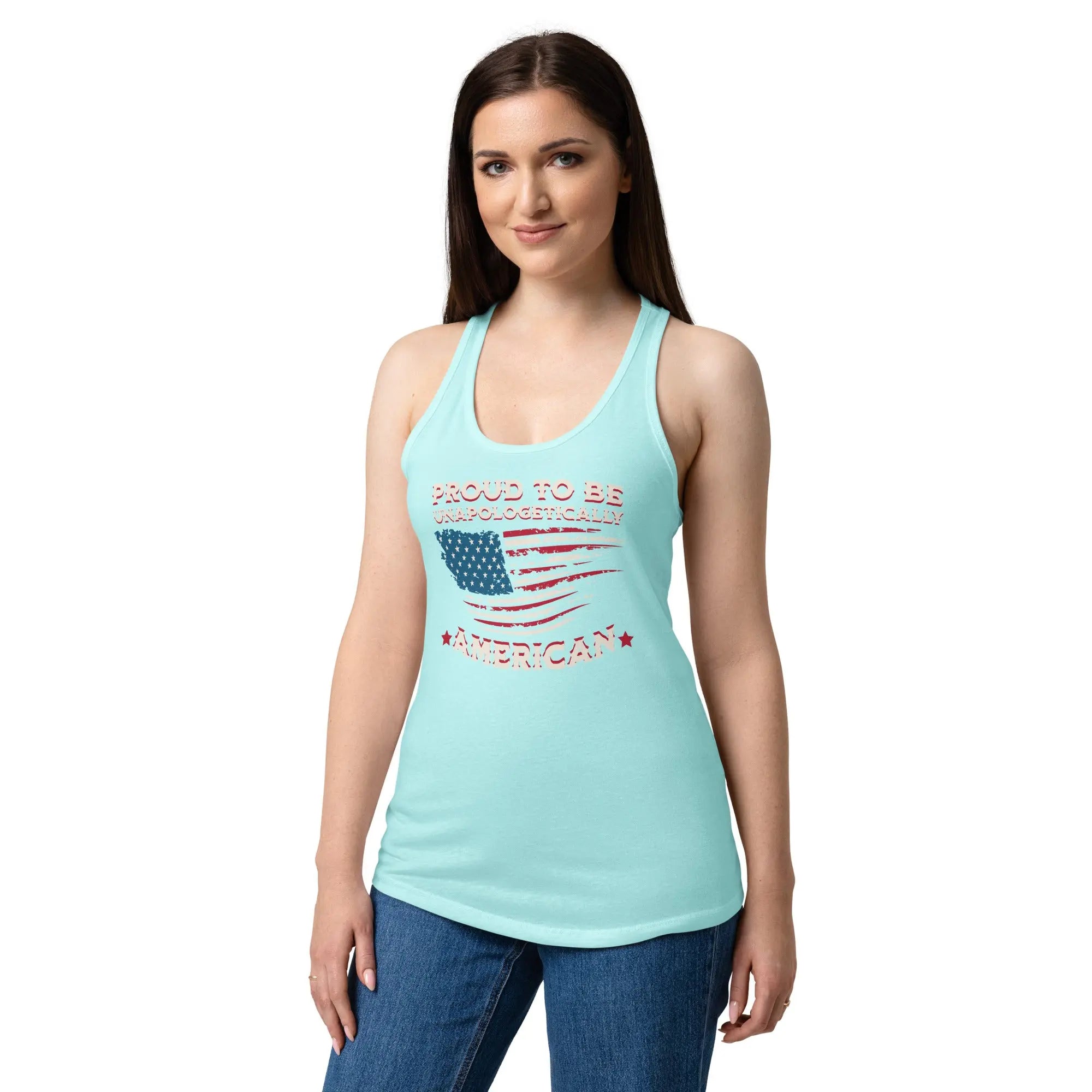 A woman wearing a cancun blue patriotic tank top with the American flag and the text "Proud to be unapologetically American" 