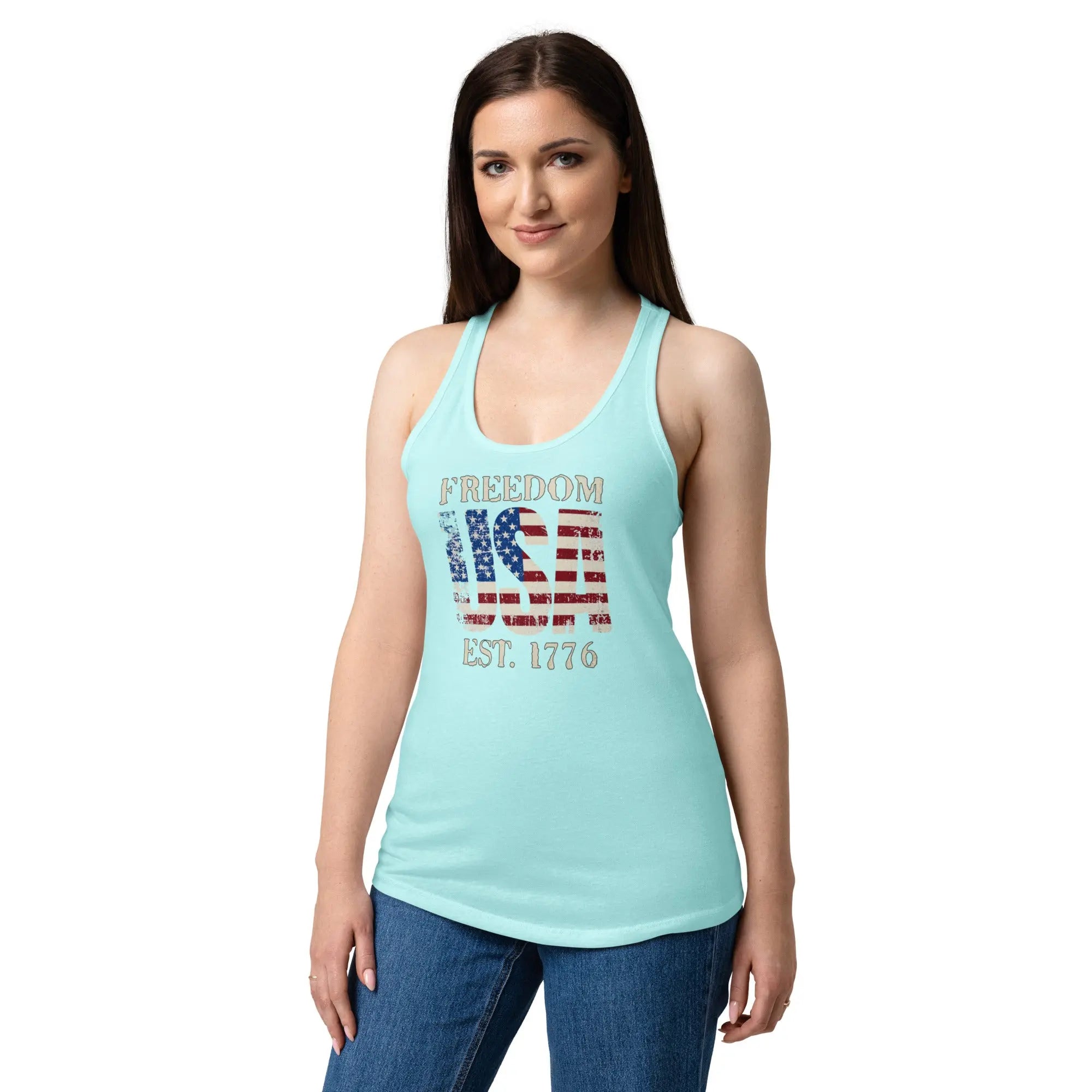 A woman wearing a cancun blue patriotic tank top with the american flag in the shape of USA and the text "Freedom set. 1776"