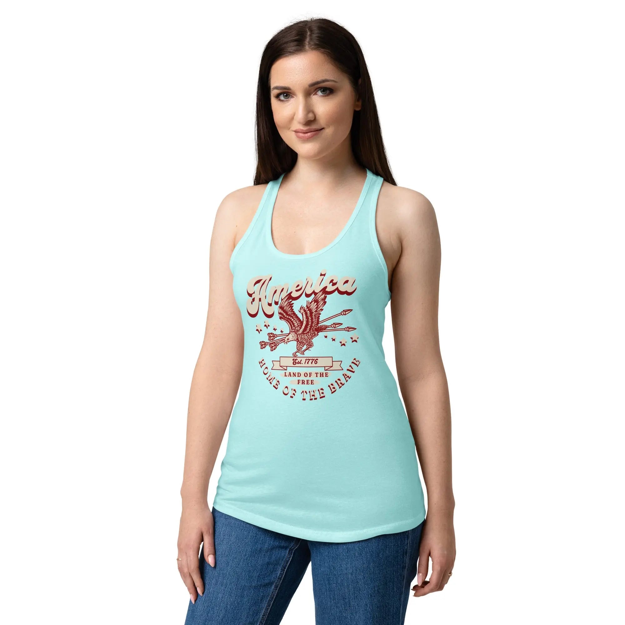 A woman wearing a cancun blue patriotic tank top with a flying eagle and the text "America Home of the brave." 