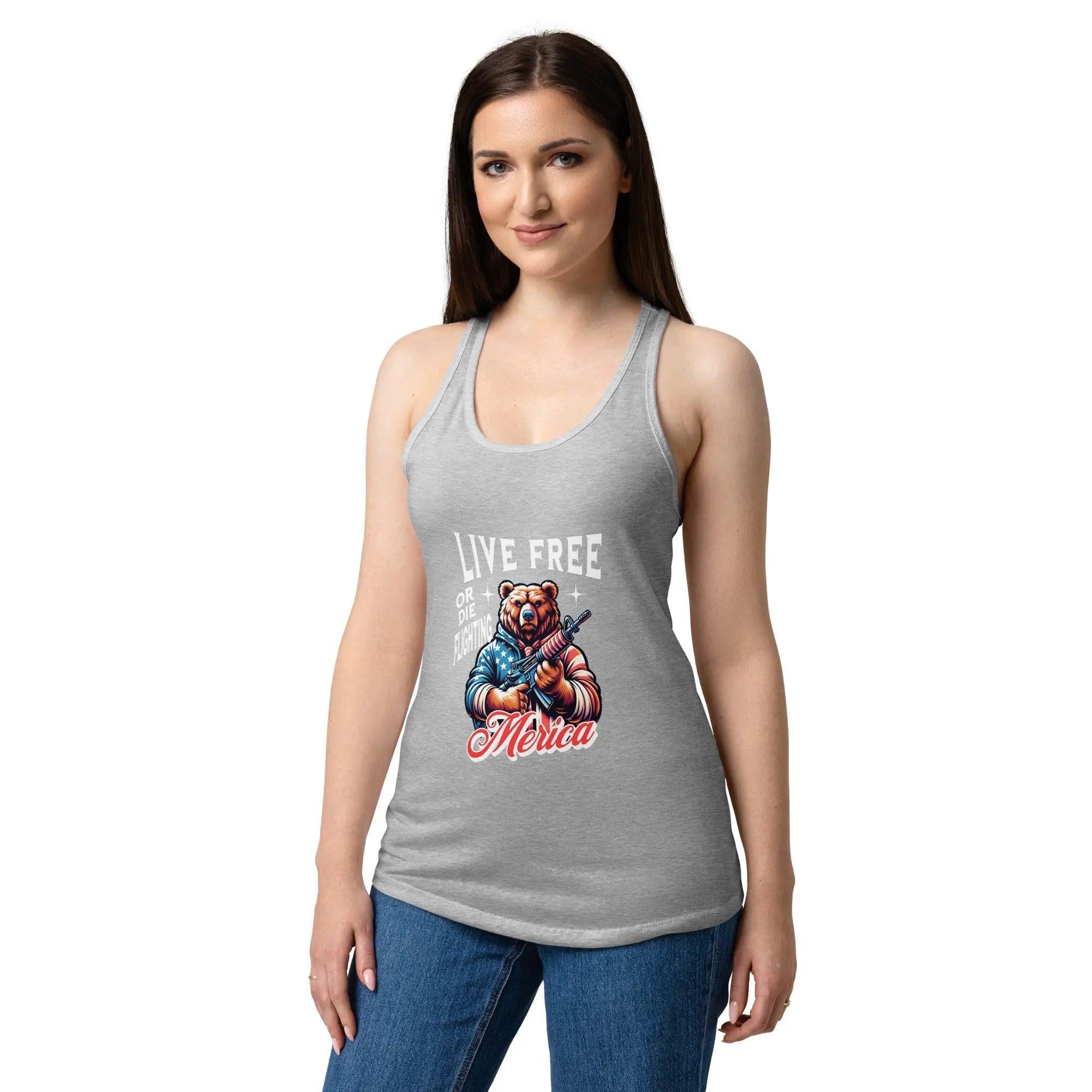 A woman wearing a heather grey patriotic tank top with a bear holding a gun and the text "Live free or die fighting." 