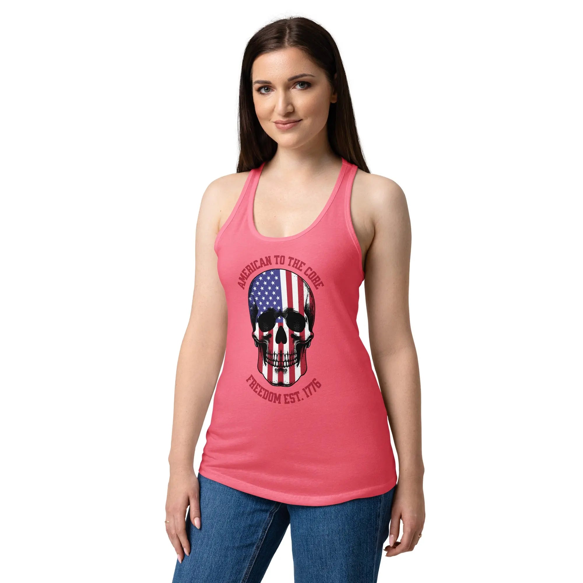 A woman wearing a hot pink patriotic tank top with a skull and the text "Freedom est. 1776."