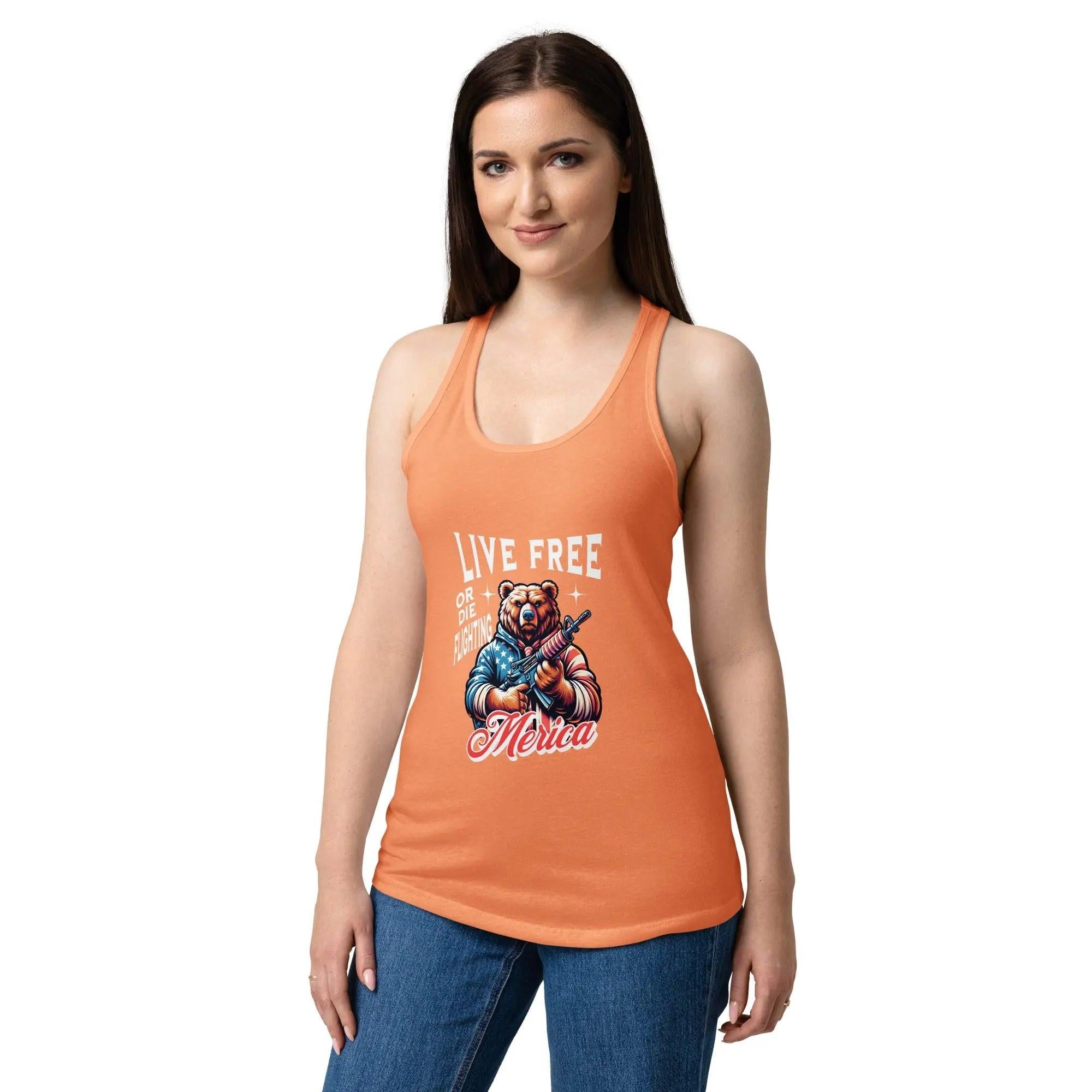 A woman wearing a light orange patriotic tank top with a bear holding a gun and the text "Live free or die fighting." 