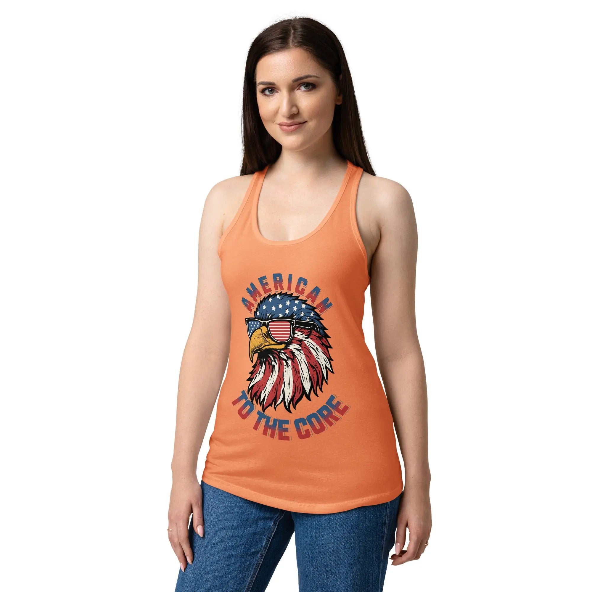 A woman wearing a light orange patriotic tank top with a eagle head and the text "American to the core"