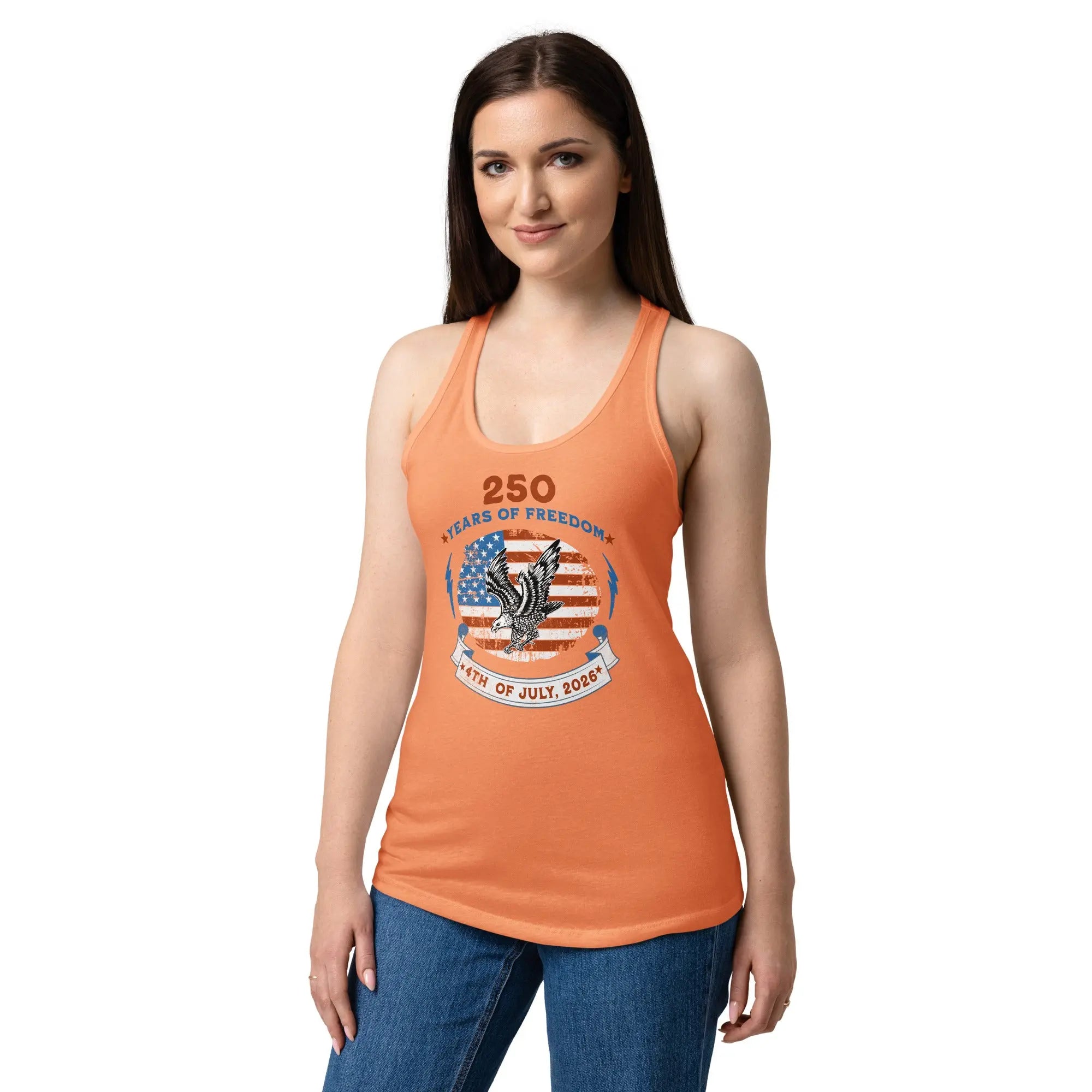 A woman wearing a light orange patriotic tank top with the American flag with a flying eagle and the text "250 years of freedom 4th of July, 2026."