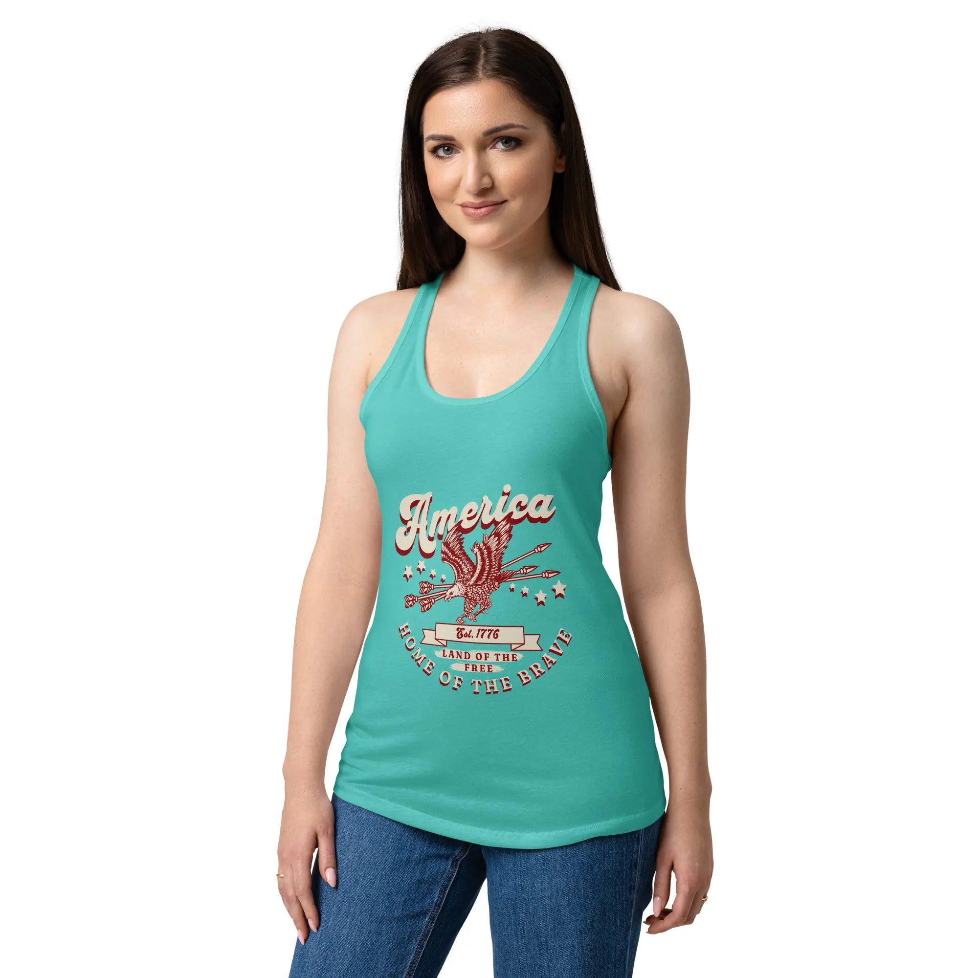 A woman wearing a tahiti blue patriotic tank top with a flying eagle and the text "America Home of the brave." 