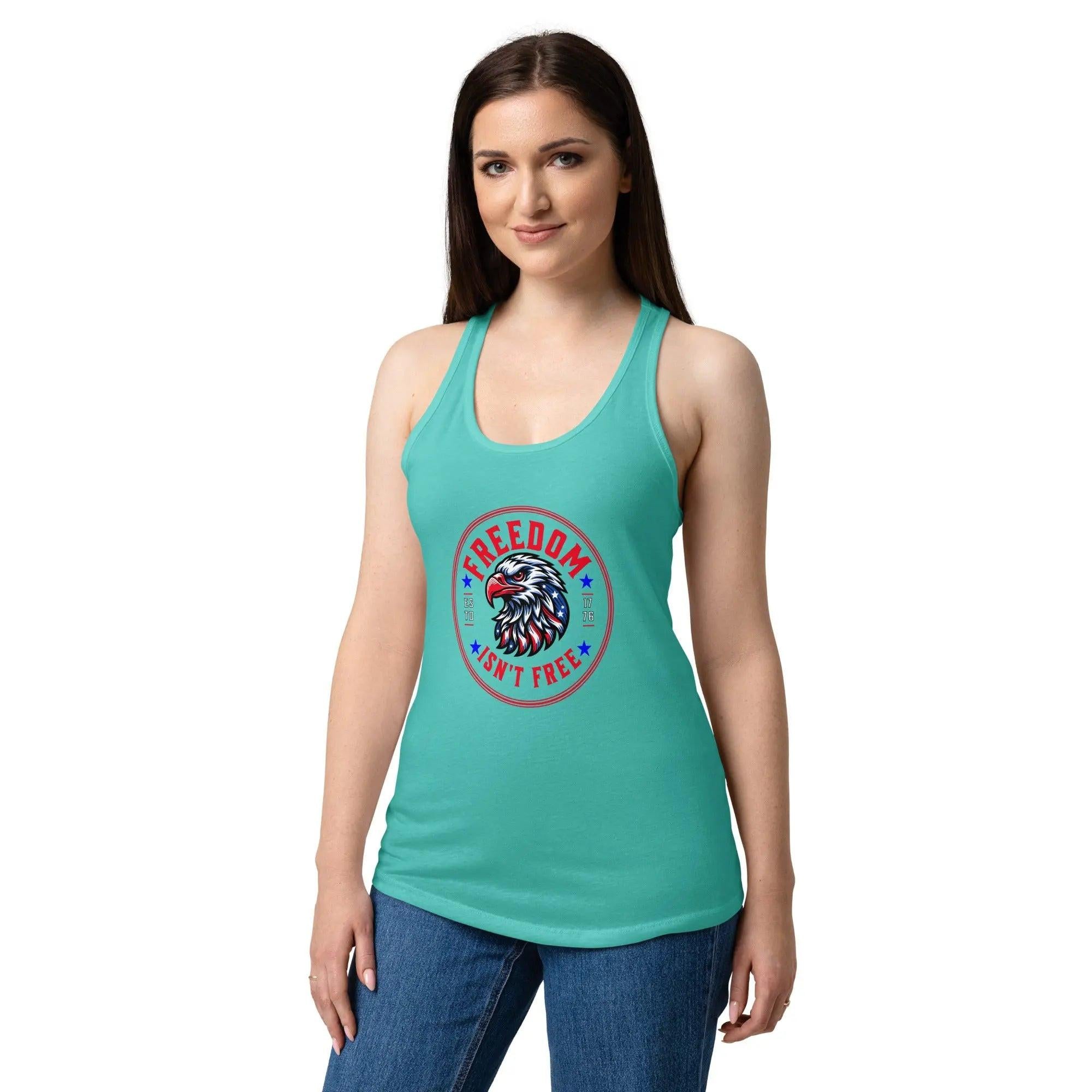 A woman wearing a tahiti blue patriotic tank top with an eagle head and the text "Freedom isn't free" 