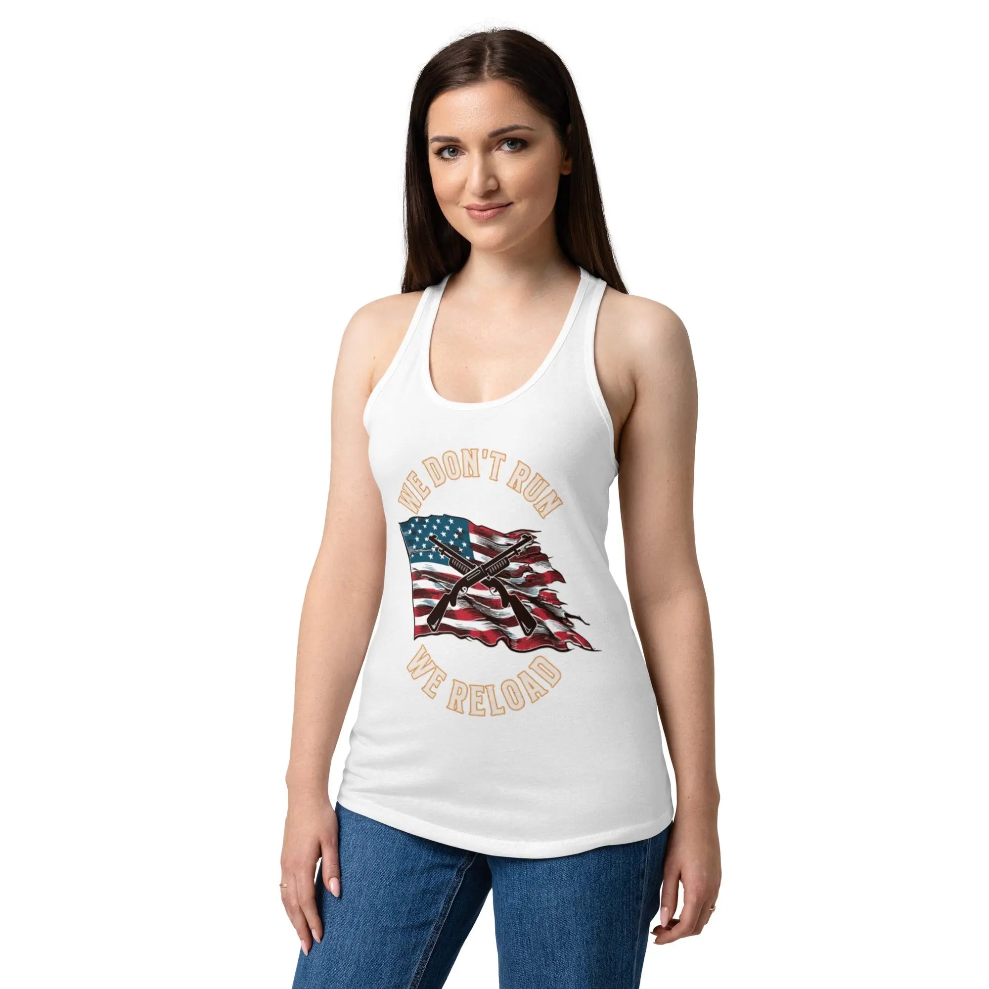 A woman wearing a white patriotic tank top with shotguns over the flag and the text "We Don't Run, We Reload."