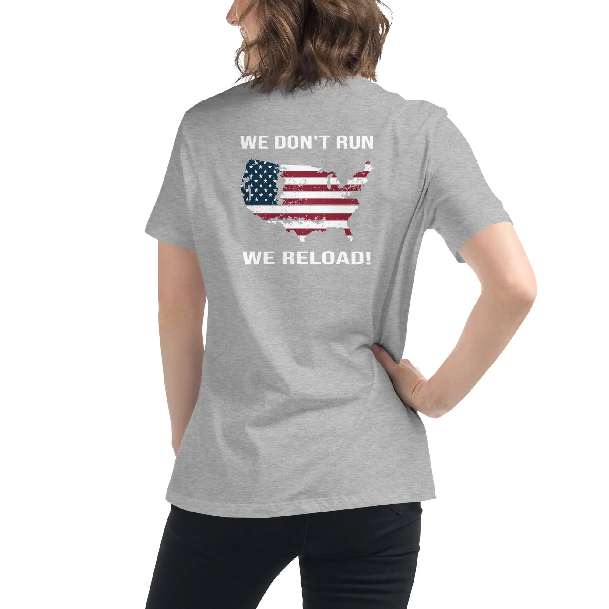 Back of woman wearing a athletic heather patriotic t-shirt with a silhouette of America and  "We Don't Run, We Reload" text