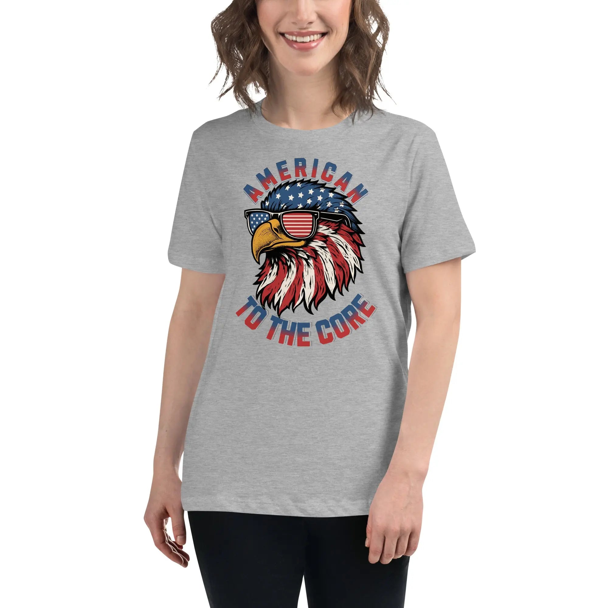 Back of woman wearing a athletic heather patriotic t-shirt with an eagle head and  "American To The Core" text