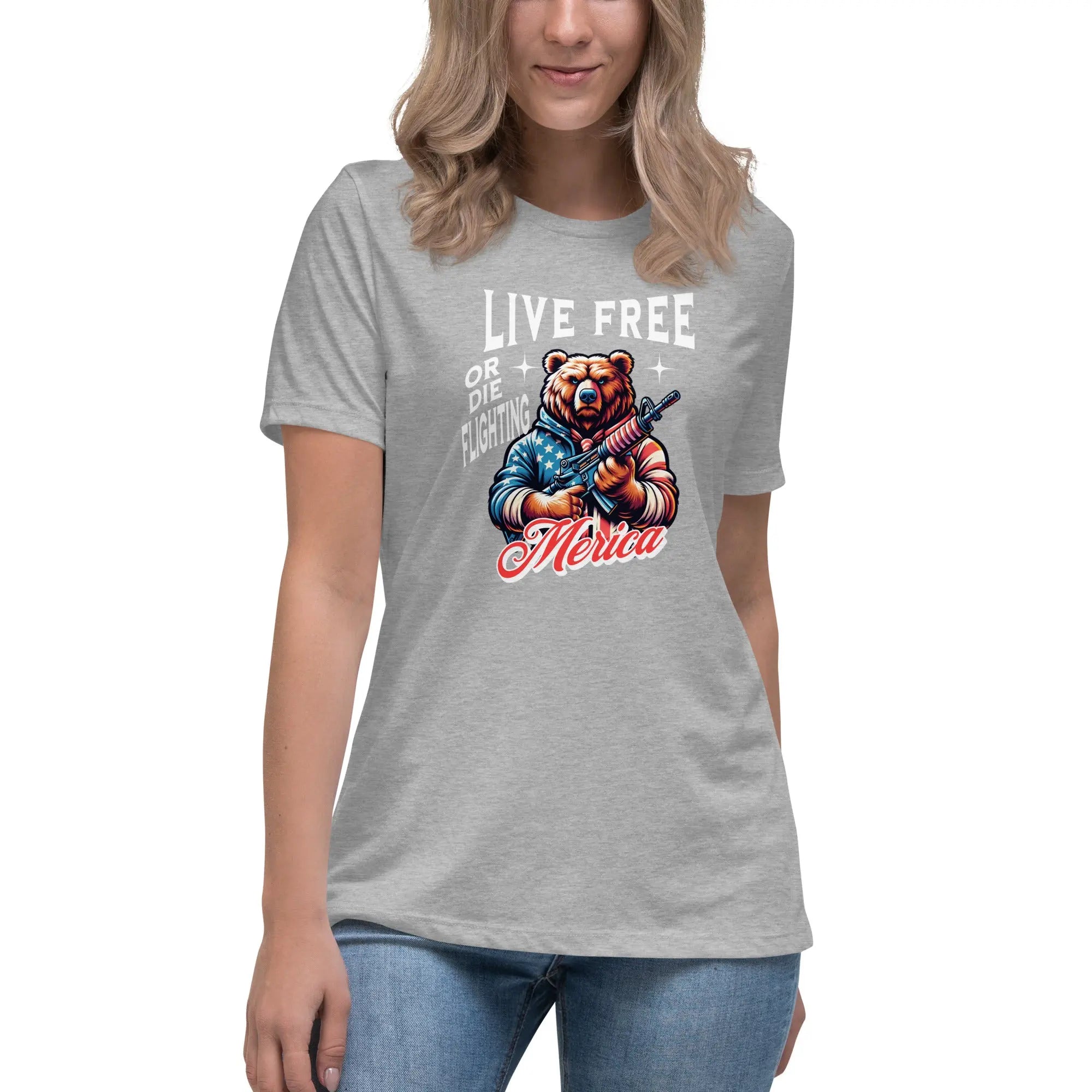 A woman wearing an athletic heather patriotic t-shirt with a bear holding a gun and "Live Free or Die Fighting" text.