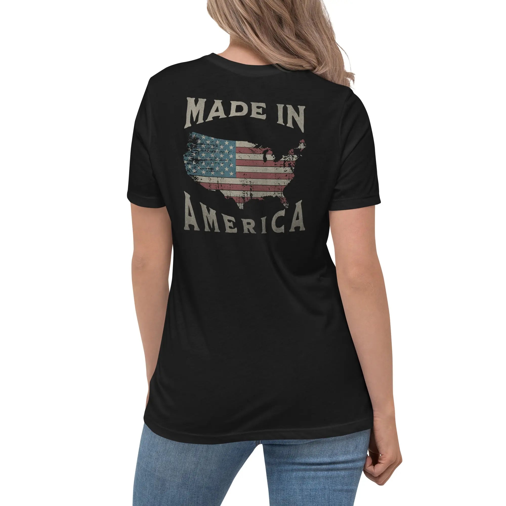 Back of woman wearing a black patriotic t-shirt with silhouette of America and  "Made In America" text