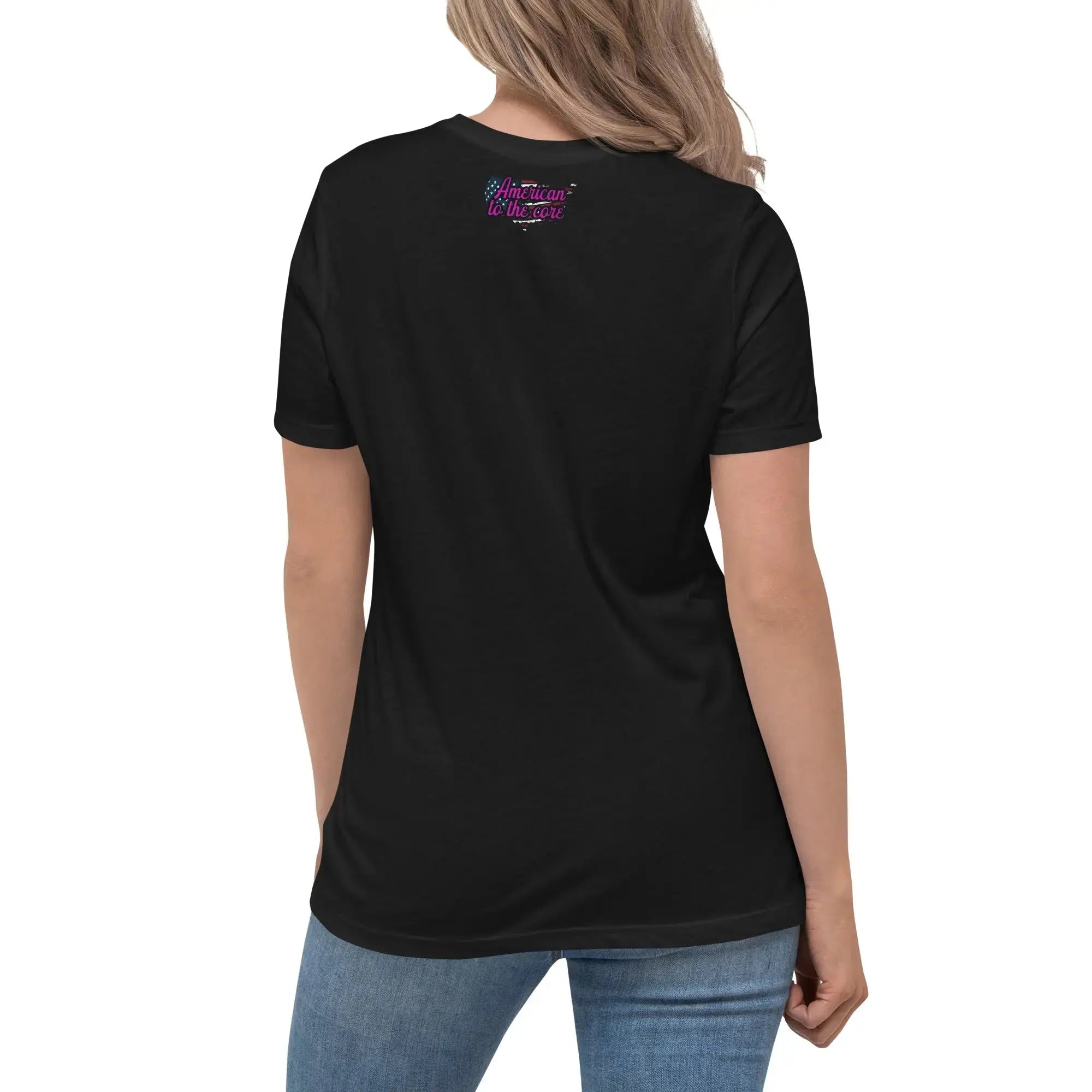 Back of a woman wearing a black patriotic t-shirt with the text "American To The Core"