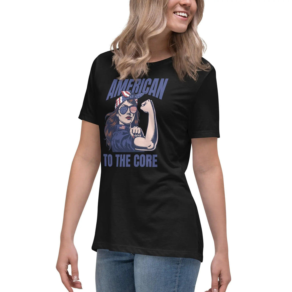 A woman wearing a black, patriotic t-shirt with a strong woman and "American To The Core" text.