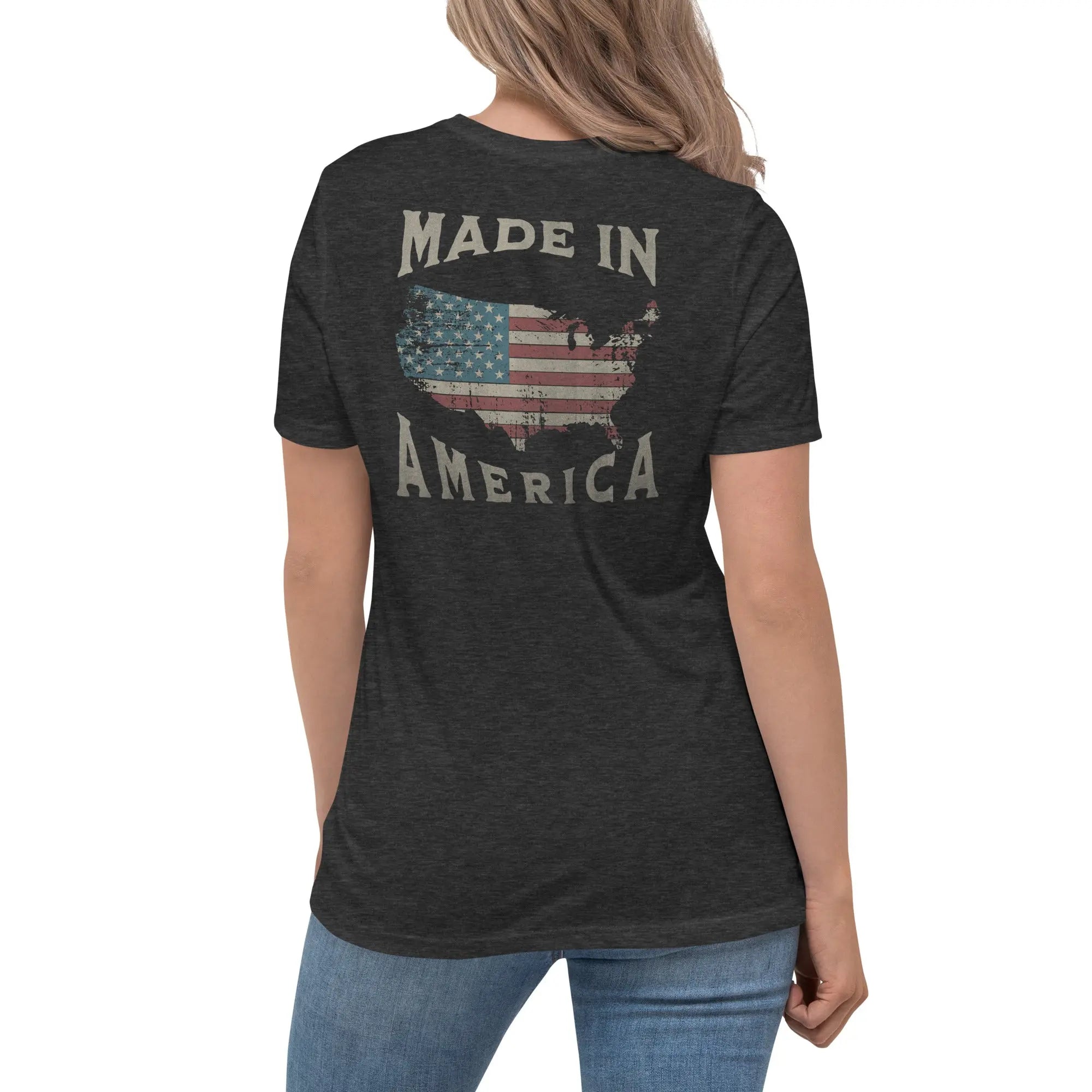 Back of woman wearing a dark grey heather patriotic t-shirt with silhouette of America and  "Made In America" text