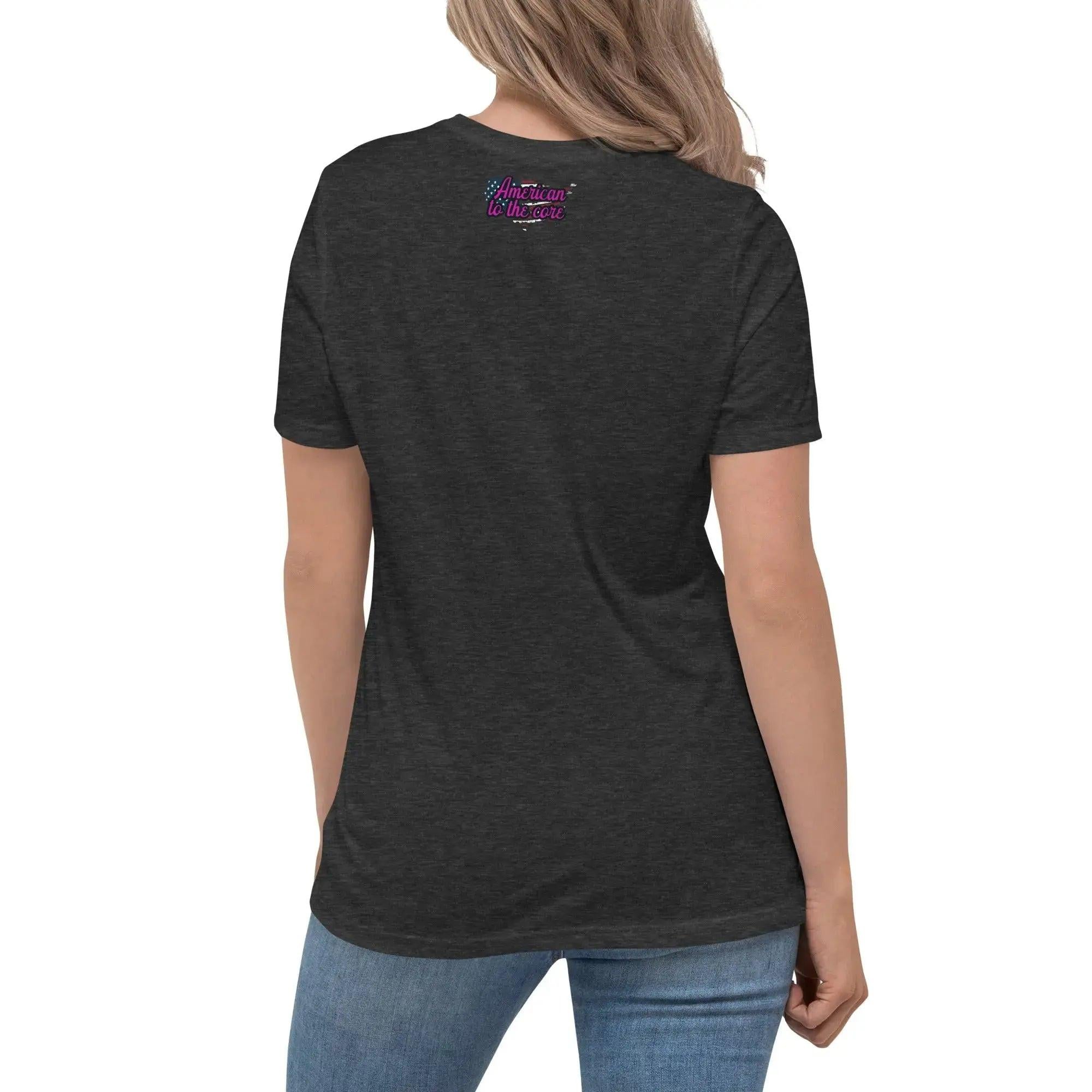 Back of a woman wearing a dark grey heather patriotic t-shirt with the text "American To The Core"