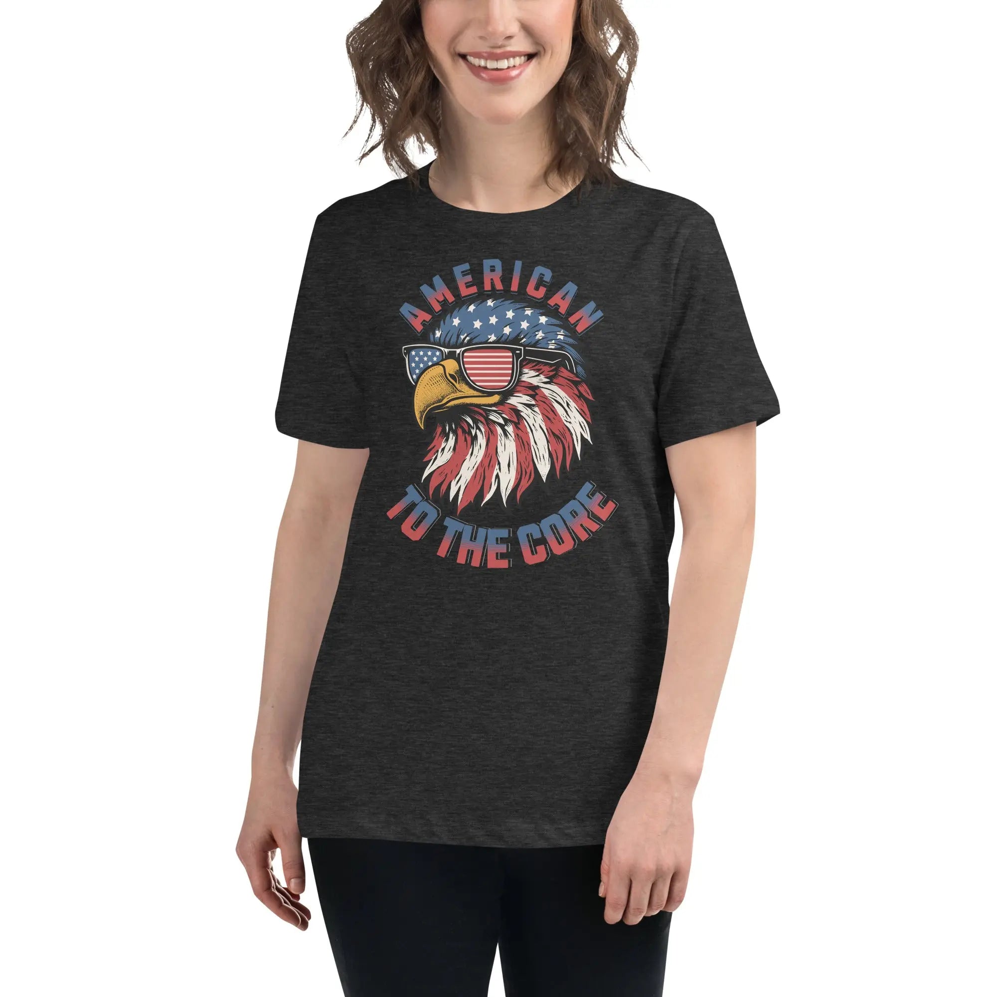 Back of woman wearing a dark grey heather patriotic t-shirt with an eagle head and  "American To The Core" text
