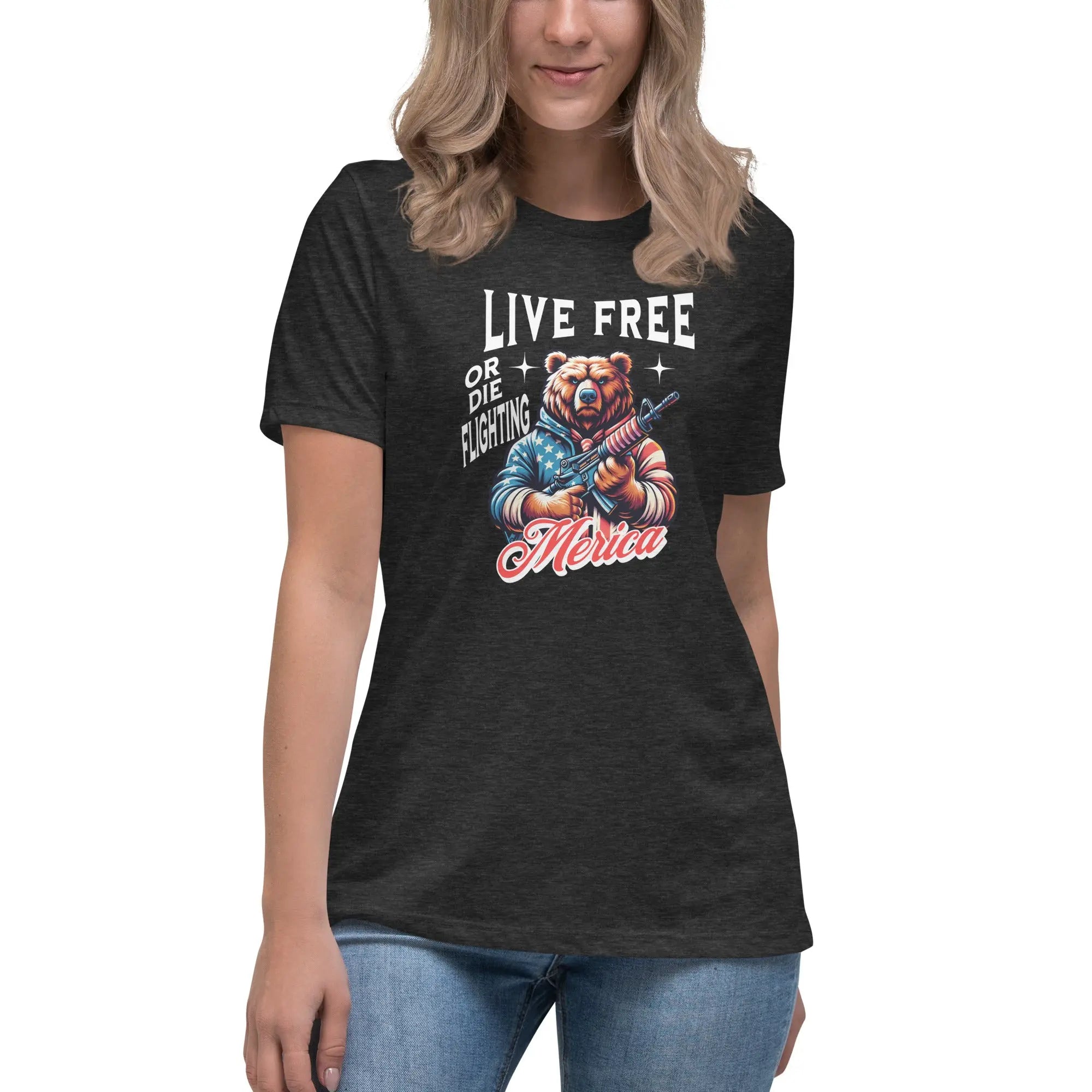 A woman wearing a dark grey heather patriotic t-shirt with a bear holding a gun and "Live Free or Die Fighting" text.