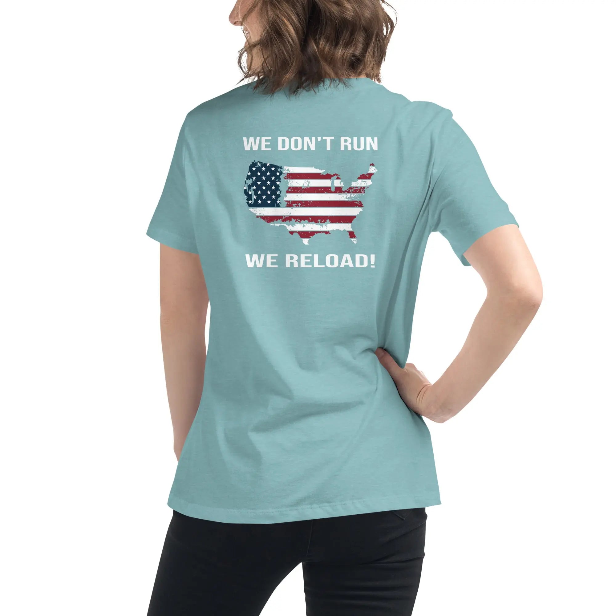 Back of woman wearing a heather blue lagoon patriotic t-shirt with a silhouette of America and  "We Don't Run, We Reload" text
