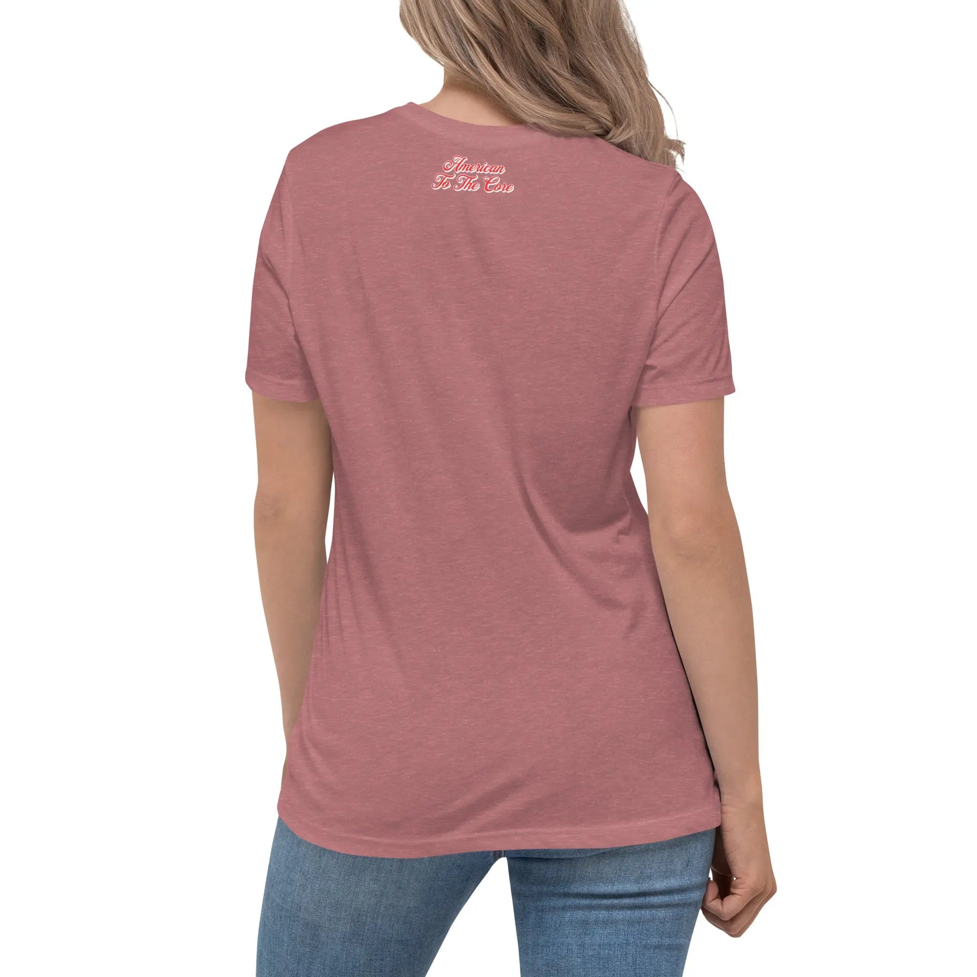 Back of woman wearing a heather mauve patriotic t-shirt with "America to the core" text