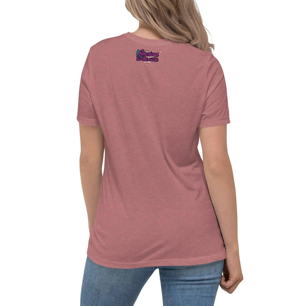 Back of a woman wearing a heather mauve patriotic t-shirt with the text "American To The Core"